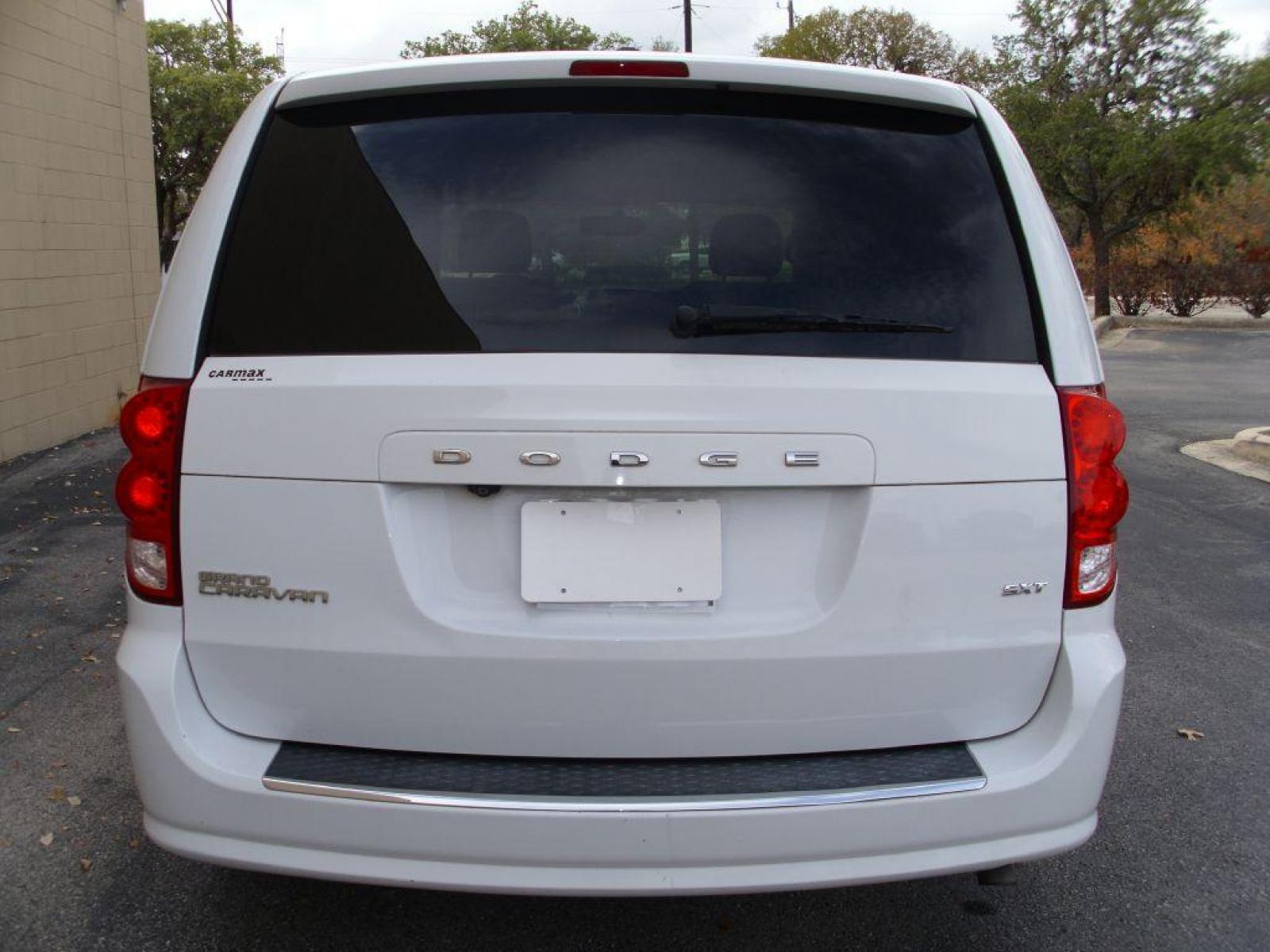 2015 WHITE DODGE GRAND CARAVAN SXT (2C4RDGCG2FR) with an 3.6L engine, Automatic transmission, located at 12019 San Pedro Avenue, San Antonio, TX, 78216, (210) 494-5895, 29.550915, -98.491142 - IMMACULATE!!!! Air Conditioning; Power Hatch/Deck; Power Windows; Power Locks; Power Steering; Tilt Wheel; AM/FM CD/MP3; Satellite; AM/FM CD/DVD; Sentry Key; Keyless Entry; Alarm; Dual Front Airbags; Side Airbags; Head Airbags; Rear Head Airbags; Active Seatbelts; All Wheel ABS; Alloy Wheels; Auxil - Photo #5