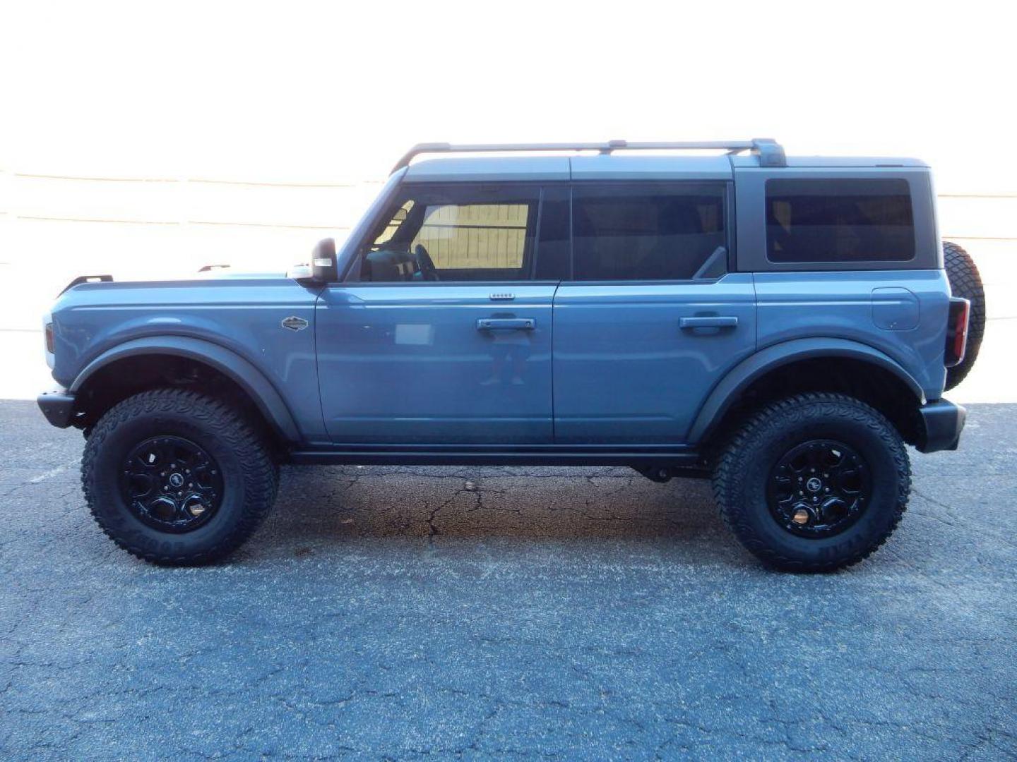 2023 BLUE FORD BRONCO Wild Trak (1FMEE5DPXPL) with an 2.7L engine, Automatic transmission, located at 12019 San Pedro Avenue, San Antonio, TX, 78216, (210) 494-5895, 29.550915, -98.491142 - We provide financing options through various third-party Credit Unions and Auto Finance Companies, including RBFCU, USAA, SSFCU, Pen Fed, Navy Fed, Credit Human Credit Union of Texas, and most other credit unions. We also work with major banks such as Capital One and Broadway Bank. Payment methods a - Photo#1