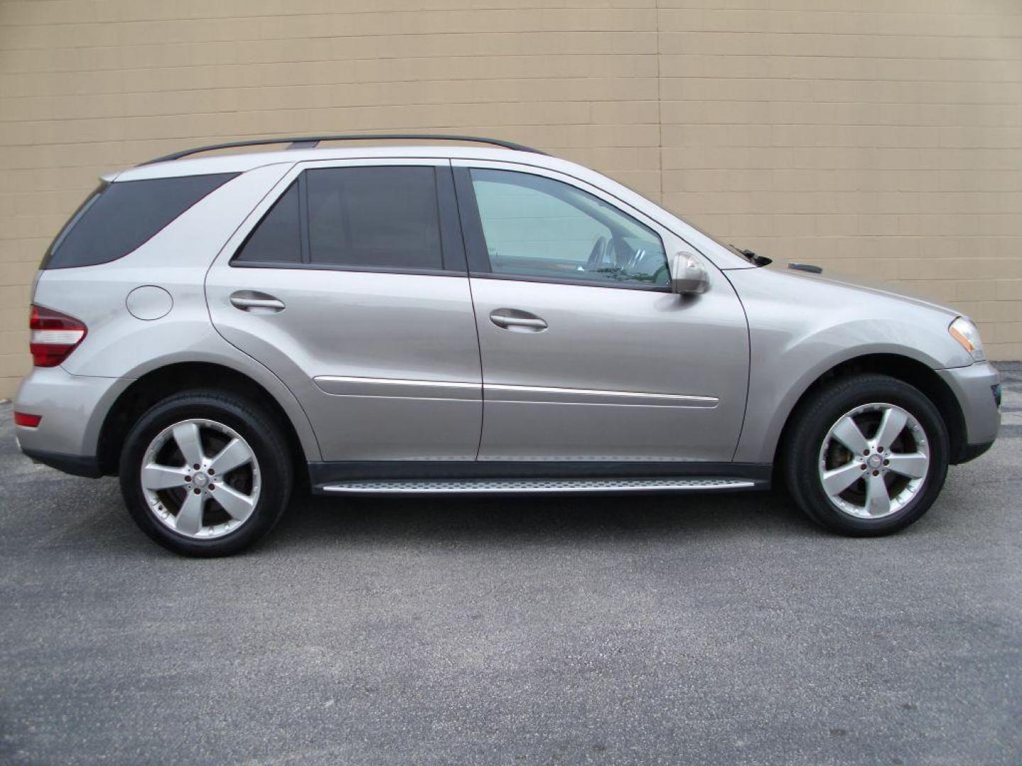 2009 TAN MERCEDES-BENZ ML350 350 (4JGBB86E89A) with an 3.5L engine, Automatic transmission, located at 12019 San Pedro Avenue, San Antonio, TX, 78216, (210) 494-5895, 29.550915, -98.491142 - LOW MILES - EXTRA CLEAN - PICTURE PERFECT - 4WD/AWD; ABS Brakes; AM/FM Stereo; Air Conditioning; Alloy Wheels; Automatic Transmission; Auxiliary Audio Input; Bluetooth Technology; CD Audio; Cruise Control; Harman Kardon Sound; Leatherette Seats; Navigation System; Overhead Airbags; Power Hatch/Deck - Photo#0