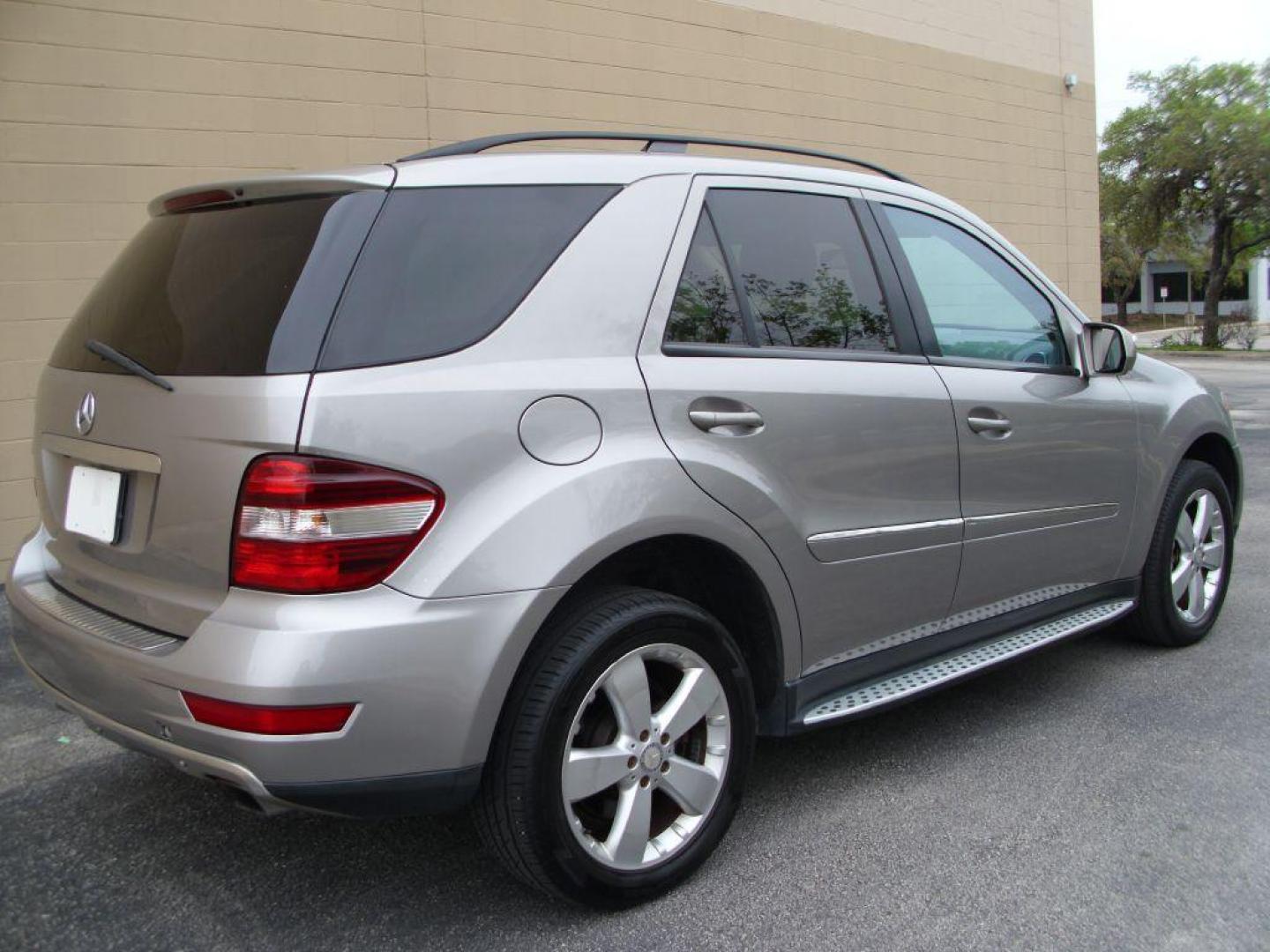 2009 TAN MERCEDES-BENZ ML350 350 (4JGBB86E89A) with an 3.5L engine, Automatic transmission, located at 12019 San Pedro Avenue, San Antonio, TX, 78216, (210) 494-5895, 29.550915, -98.491142 - LOW MILES - EXTRA CLEAN - PICTURE PERFECT - 4WD/AWD; ABS Brakes; AM/FM Stereo; Air Conditioning; Alloy Wheels; Automatic Transmission; Auxiliary Audio Input; Bluetooth Technology; CD Audio; Cruise Control; Harman Kardon Sound; Leatherette Seats; Navigation System; Overhead Airbags; Power Hatch/Deck - Photo#3