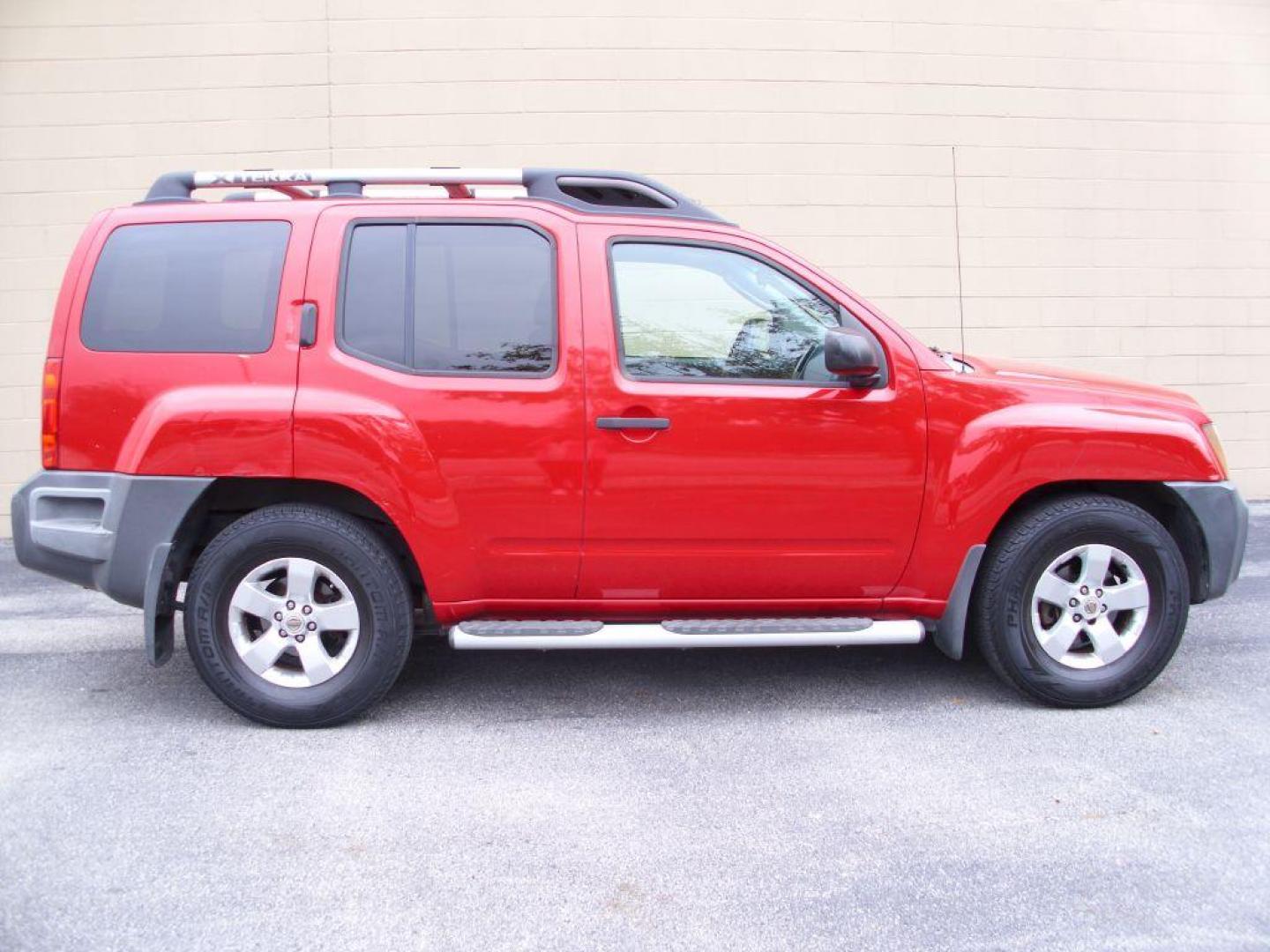 2009 RED NISSAN XTERRA OFF ROAD (5N1AN08U69C) with an 4.0L engine, Automatic transmission, located at 12019 San Pedro Avenue, San Antonio, TX, 78216, (210) 494-5895, 29.550915, -98.491142 - Photo#0