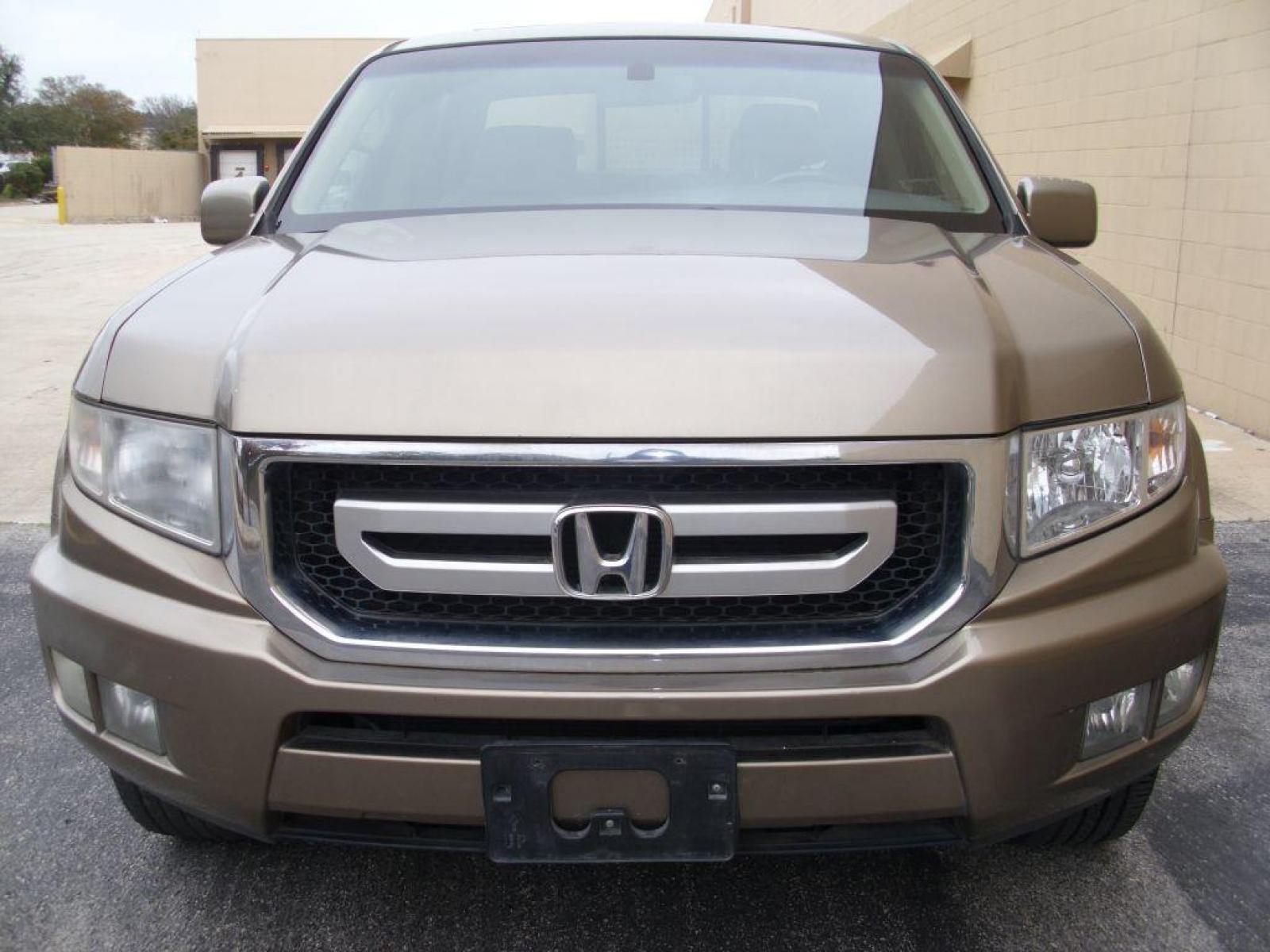 2009 BROWN HONDA RIDGELINE RTL (2HJYK16599H) with an 3.5L engine, Automatic transmission, located at 12019 San Pedro Avenue, San Antonio, TX, 78216, (210) 494-5895, 29.550915, -98.491142 - LOW, LOW MILES - LEATHER - NEW TIRES - RARE FIND!!! Air Conditioning; Power Windows; Power Locks; Power Steering; Tilt Wheel; AM/FM CD/MP3; Satellite; Immobilizer; Keyless Entry; Alarm; Daytime Running Lights; Dual Front Airbags; Side Airbags; Head Airbags; Rear Head Airbags; Active Seatbelts; Crew - Photo #2