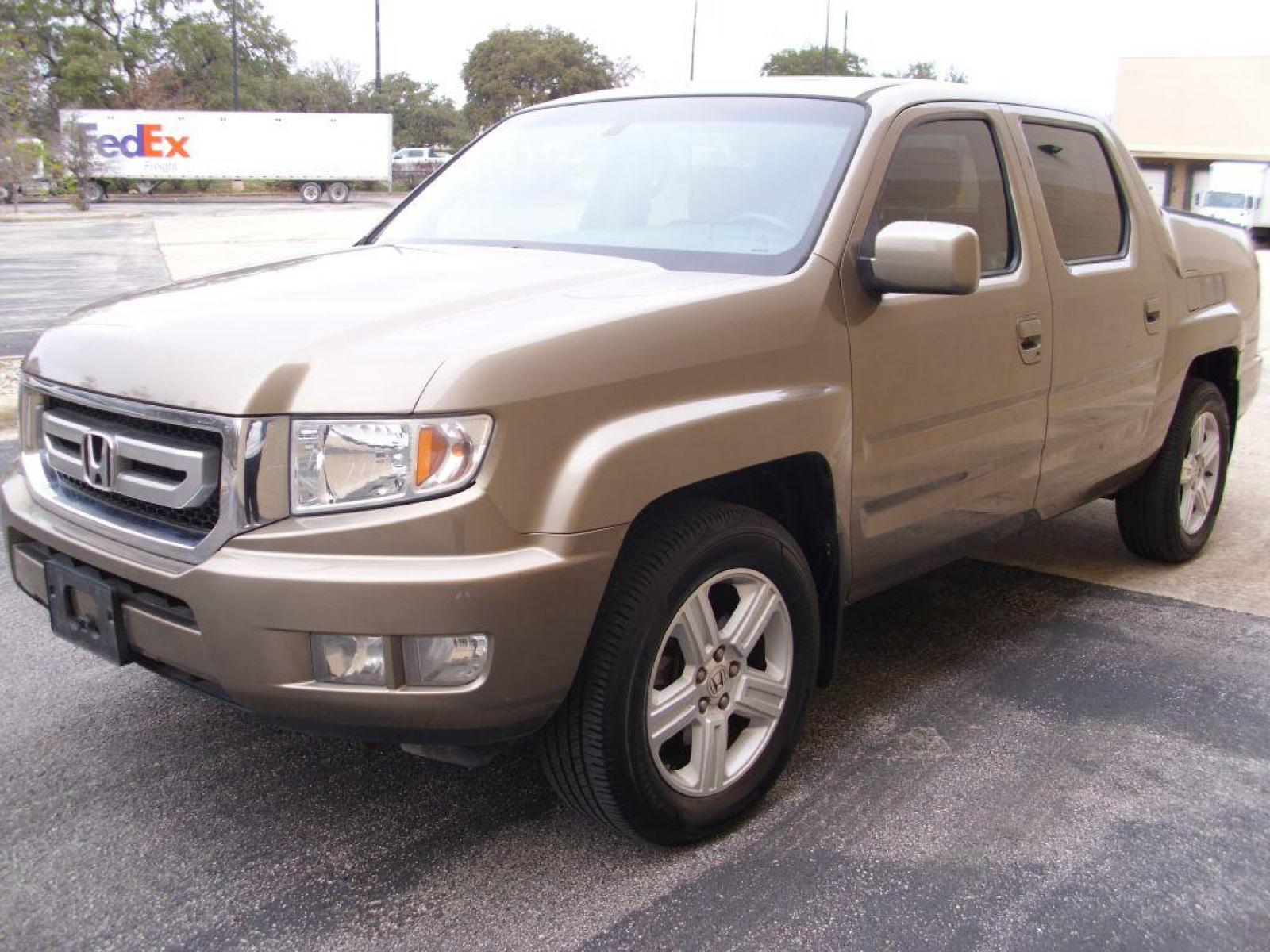 2009 BROWN HONDA RIDGELINE RTL (2HJYK16599H) with an 3.5L engine, Automatic transmission, located at 12019 San Pedro Avenue, San Antonio, TX, 78216, (210) 494-5895, 29.550915, -98.491142 - LOW, LOW MILES - LEATHER - NEW TIRES - RARE FIND!!! Air Conditioning; Power Windows; Power Locks; Power Steering; Tilt Wheel; AM/FM CD/MP3; Satellite; Immobilizer; Keyless Entry; Alarm; Daytime Running Lights; Dual Front Airbags; Side Airbags; Head Airbags; Rear Head Airbags; Active Seatbelts; Crew - Photo #5