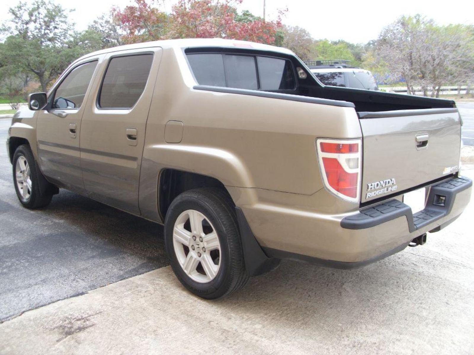 2009 BROWN HONDA RIDGELINE RTL (2HJYK16599H) with an 3.5L engine, Automatic transmission, located at 12019 San Pedro Avenue, San Antonio, TX, 78216, (210) 494-5895, 29.550915, -98.491142 - LOW, LOW MILES - LEATHER - NEW TIRES - RARE FIND!!! Air Conditioning; Power Windows; Power Locks; Power Steering; Tilt Wheel; AM/FM CD/MP3; Satellite; Immobilizer; Keyless Entry; Alarm; Daytime Running Lights; Dual Front Airbags; Side Airbags; Head Airbags; Rear Head Airbags; Active Seatbelts; Crew - Photo #6