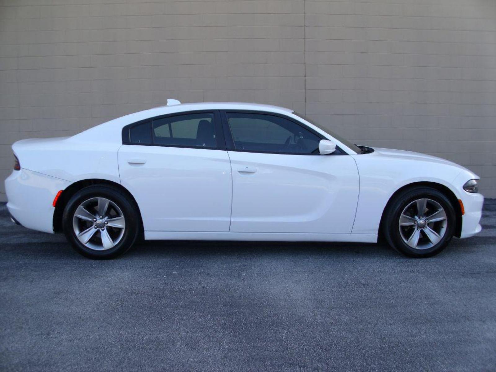 2016 WHITE DODGE CHARGER SXT (2C3CDXHGXGH) with an 3.6L engine, Automatic transmission, located at 12019 San Pedro Avenue, San Antonio, TX, 78216, (210) 494-5895, 29.550915, -98.491142 - LOW MILES - VERY CLEAN - RUNS GREAT!!! Air Conditioning; Power Windows; Power Locks; Power Steering; Tilt Wheel; AM/FM CD ; Sentry Key; Keyless Entry; Alarm; Daytime Running Lights; Dual Front Airbags; Side Airbags; Head Airbags; Rear Head Airbags; Active Seatbelts; All Wheel ABS; Alloy Wheels; Alp - Photo #0