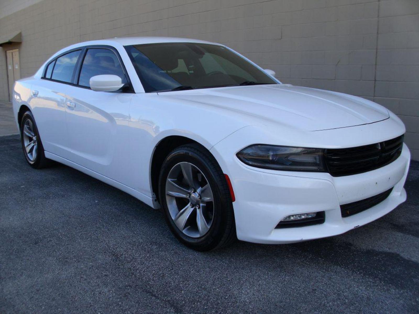 2016 WHITE DODGE CHARGER SXT (2C3CDXHGXGH) with an 3.6L engine, Automatic transmission, located at 12019 San Pedro Avenue, San Antonio, TX, 78216, (210) 494-5895, 29.550915, -98.491142 - LOW MILES - VERY CLEAN - RUNS GREAT!!! Air Conditioning; Power Windows; Power Locks; Power Steering; Tilt Wheel; AM/FM CD ; Sentry Key; Keyless Entry; Alarm; Daytime Running Lights; Dual Front Airbags; Side Airbags; Head Airbags; Rear Head Airbags; Active Seatbelts; All Wheel ABS; Alloy Wheels; Alp - Photo #5