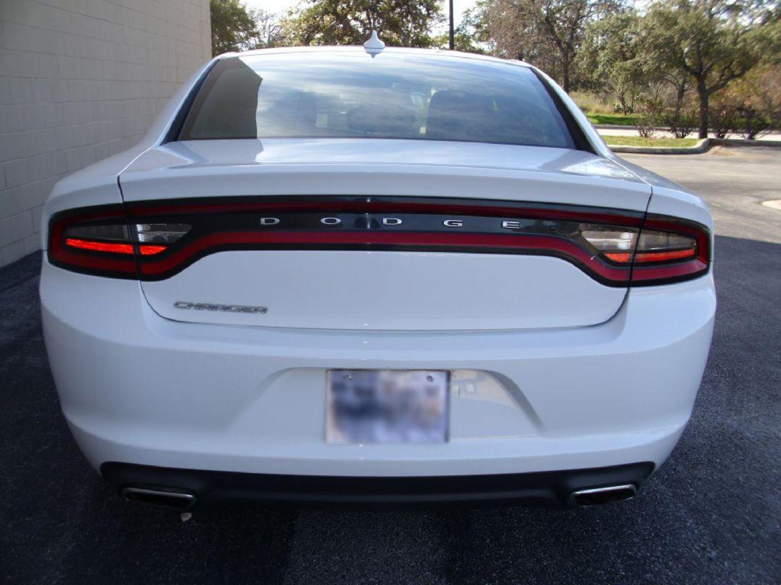 2016 WHITE DODGE CHARGER SXT (2C3CDXHGXGH) with an 3.6L engine, Automatic transmission, located at 12019 San Pedro Avenue, San Antonio, TX, 78216, (210) 494-5895, 29.550915, -98.491142 - LOW MILES - VERY CLEAN - RUNS GREAT!!! Air Conditioning; Power Windows; Power Locks; Power Steering; Tilt Wheel; AM/FM CD ; Sentry Key; Keyless Entry; Alarm; Daytime Running Lights; Dual Front Airbags; Side Airbags; Head Airbags; Rear Head Airbags; Active Seatbelts; All Wheel ABS; Alloy Wheels; Alp - Photo #3