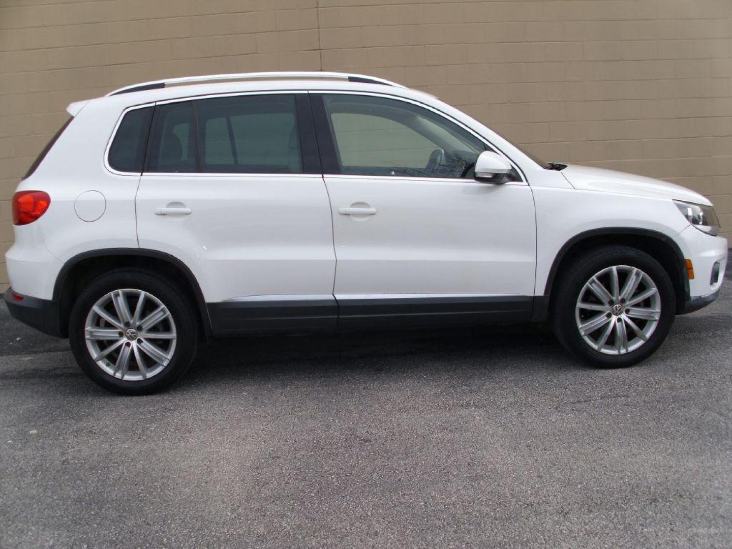 2013 WHITE VOLKSWAGEN TIGUAN S (WVGAV7AX8DW) with an 2.0L engine, Automatic transmission, located at 12019 San Pedro Avenue, San Antonio, TX, 78216, (210) 494-5895, 29.550915, -98.491142 - Photo#0