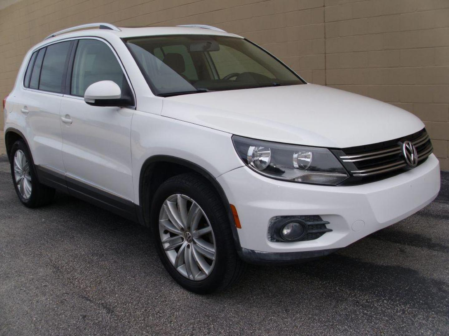 2013 WHITE VOLKSWAGEN TIGUAN S (WVGAV7AX8DW) with an 2.0L engine, Automatic transmission, located at 12019 San Pedro Avenue, San Antonio, TX, 78216, (210) 494-5895, 29.550915, -98.491142 - Photo#2