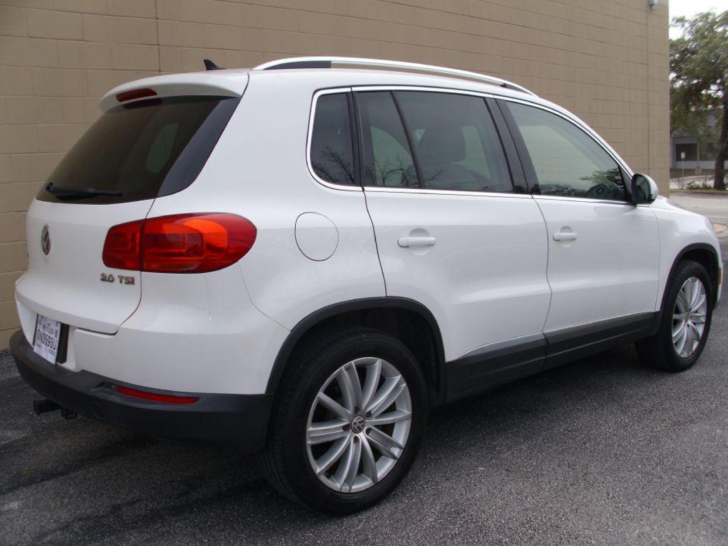 2013 WHITE VOLKSWAGEN TIGUAN S (WVGAV7AX8DW) with an 2.0L engine, Automatic transmission, located at 12019 San Pedro Avenue, San Antonio, TX, 78216, (210) 494-5895, 29.550915, -98.491142 - Photo#4