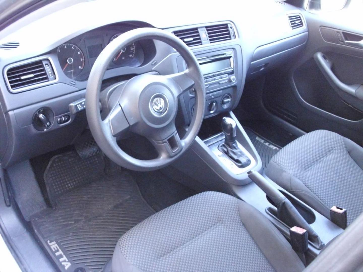 2012 SILVER VOLKSWAGEN JETTA BASE (3VW2K7AJ1CM) with an 2.0L engine, Automatic transmission, located at 2215 Harry Wurzbach Rd , San Antonio, TX, 78209, (208) 269-7240, 29.491415, -98.432098 - ONE OWNER!! RELIABLE CAR!! Cloth Seats; Air Conditioning; Power Windows; Power Locks; Power Steering; Tilt Wheel; AM/FM CD/MP3; Immobilizer; Keyless Entry; Alarm; Daytime Running Lights; Dual Air Bags Front Head and Sides; Active Belts; All Wheel ABS ** WE DO NOT OFFER BUY HERE PAY HERE FINANCING- Photo#7