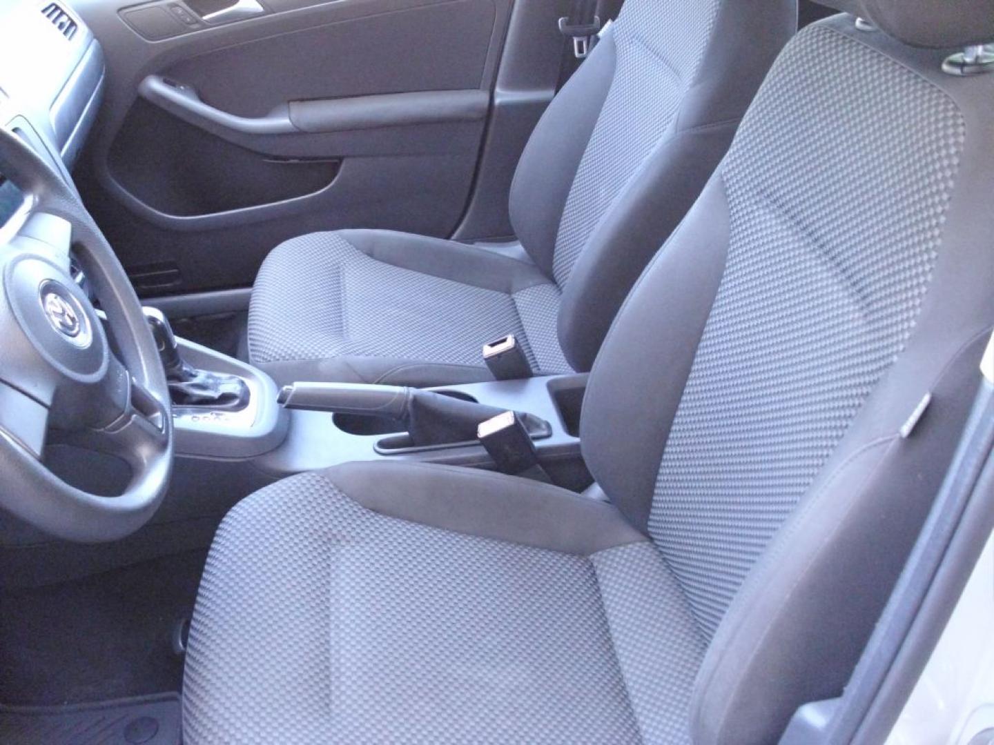 2012 SILVER VOLKSWAGEN JETTA BASE (3VW2K7AJ1CM) with an 2.0L engine, Automatic transmission, located at 2215 Harry Wurzbach Rd , San Antonio, TX, 78209, (208) 269-7240, 29.491415, -98.432098 - ONE OWNER!! RELIABLE CAR!! Cloth Seats; Air Conditioning; Power Windows; Power Locks; Power Steering; Tilt Wheel; AM/FM CD/MP3; Immobilizer; Keyless Entry; Alarm; Daytime Running Lights; Dual Air Bags Front Head and Sides; Active Belts; All Wheel ABS ** WE DO NOT OFFER BUY HERE PAY HERE FINANCING- Photo#8