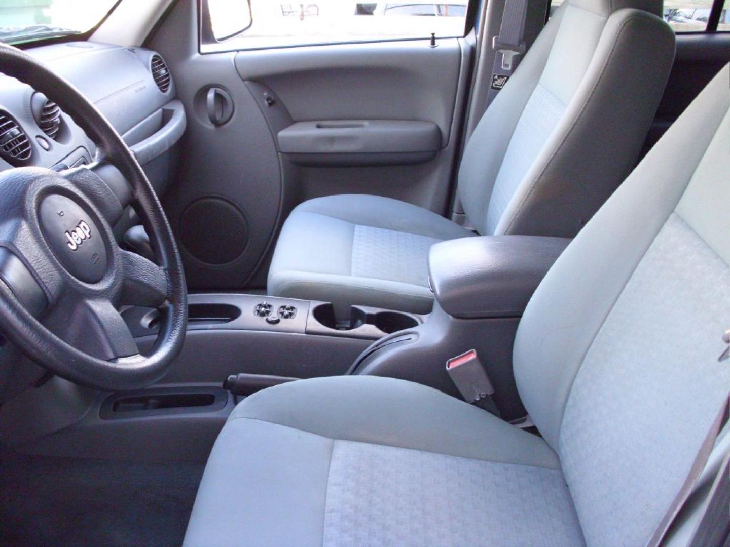 2006 BLUE JEEP LIBERTY SPORT (1J4GK48K26W) with an 3.7L engine, Automatic transmission, located at 2215 Harry Wurzbach Rd , San Antonio, TX, 78209, (208) 269-7240, 29.491415, -98.432098 - NO Accidents or Damages! Great 2 Wheel Drive Vehicle! Cloth Seats; Tow Hitch; Air Conditioning; Power Windows; Power Locks; Power Steering; Tilt Wheel; AM/FM CD; Sentry Key; Alarm; Dual Front Air Bag; Active Belts; All Wheel ABS ** WE DO NOT OFFER BUY HERE PAY HERE FINANCING. or Sub-Prime credit- Photo#7