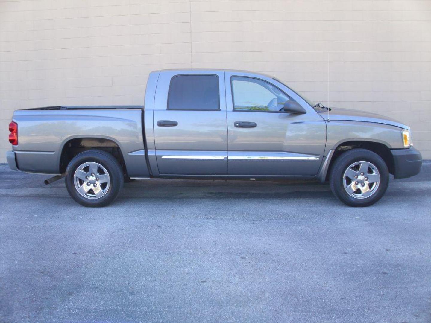 2005 GRAY DODGE DAKOTA QUAD (1D7HE28K15S) with an 3.7L engine, Automatic transmission, located at 12019 San Pedro Avenue, San Antonio, TX, 78216, (208) 269-7240, 29.550915, -98.491142 - Great Truck! ONE OWNER! No accidents or damages! Air Conditioning; Power Steering; Tilt Wheel; AM/FM CD; Dual Front Air Bag; Active Belts; Crew Cab; Short Bed; All Wheel ABS; 1/2 Ton We provide financing options through various third-party Credit Unions and Auto Finance Companies, including RBFC - Photo#0
