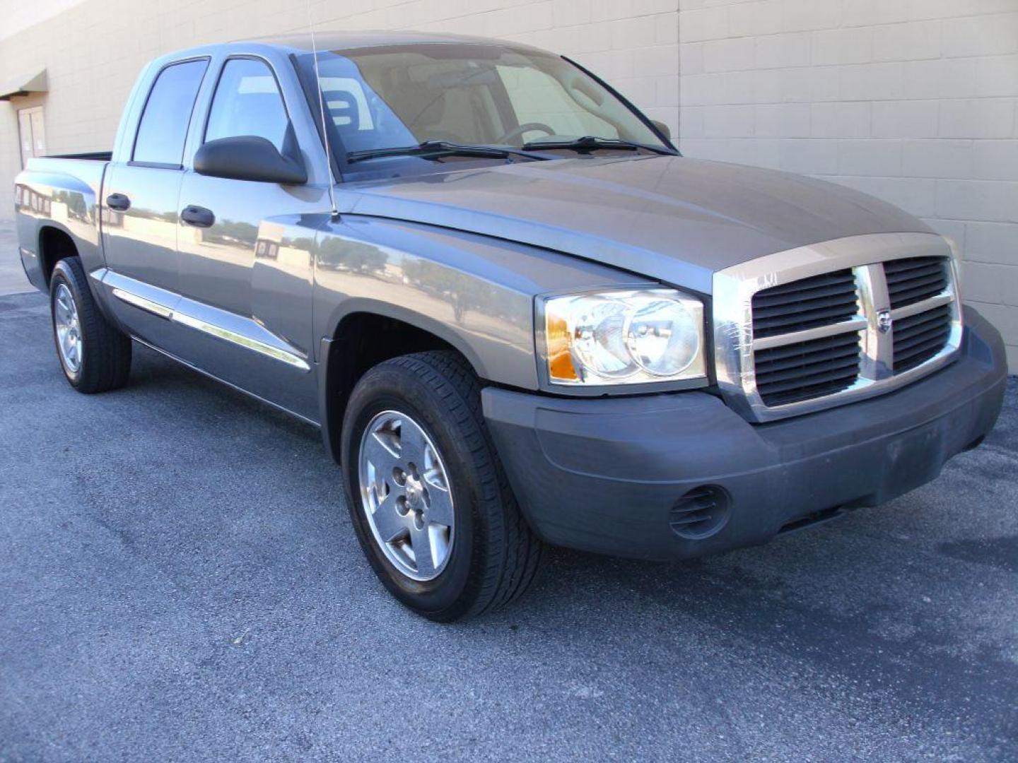 2005 GRAY DODGE DAKOTA QUAD (1D7HE28K15S) with an 3.7L engine, Automatic transmission, located at 12019 San Pedro Avenue, San Antonio, TX, 78216, (208) 269-7240, 29.550915, -98.491142 - Great Truck! ONE OWNER! No accidents or damages! Air Conditioning; Power Steering; Tilt Wheel; AM/FM CD; Dual Front Air Bag; Active Belts; Crew Cab; Short Bed; All Wheel ABS; 1/2 Ton We provide financing options through various third-party Credit Unions and Auto Finance Companies, including RBFC - Photo#1