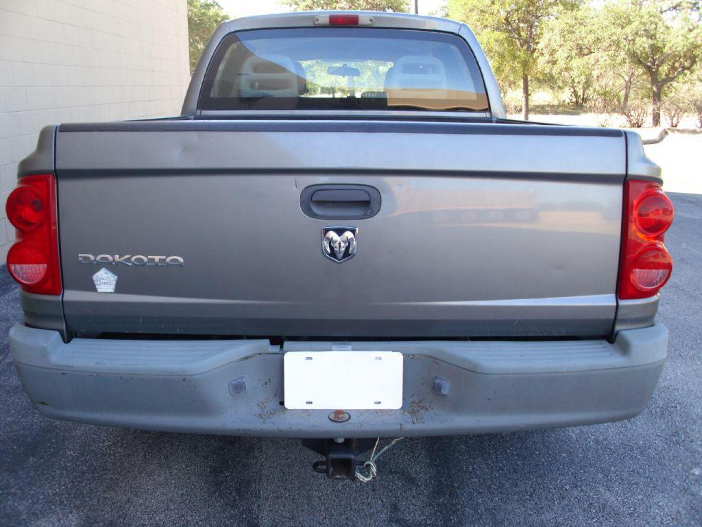 2005 GRAY DODGE DAKOTA QUAD (1D7HE28K15S) with an 3.7L engine, Automatic transmission, located at 12019 San Pedro Avenue, San Antonio, TX, 78216, (208) 269-7240, 29.550915, -98.491142 - Great Truck! ONE OWNER! No accidents or damages! Air Conditioning; Power Steering; Tilt Wheel; AM/FM CD; Dual Front Air Bag; Active Belts; Crew Cab; Short Bed; All Wheel ABS; 1/2 Ton We provide financing options through various third-party Credit Unions and Auto Finance Companies, including RBFC - Photo#6