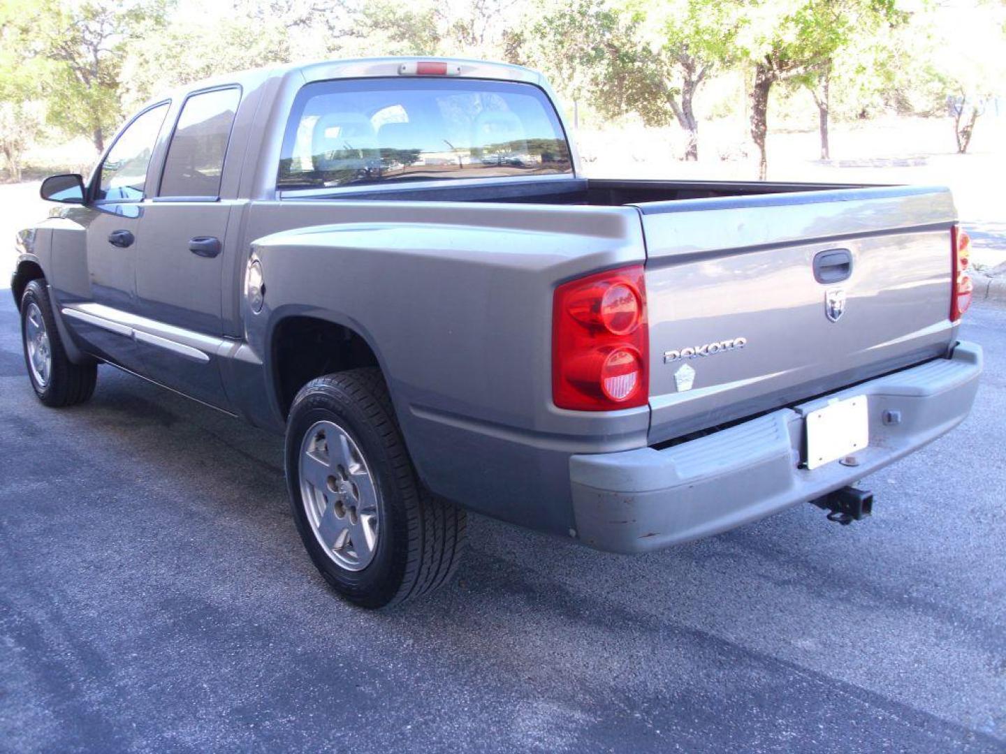 2005 GRAY DODGE DAKOTA QUAD (1D7HE28K15S) with an 3.7L engine, Automatic transmission, located at 12019 San Pedro Avenue, San Antonio, TX, 78216, (208) 269-7240, 29.550915, -98.491142 - Great Truck! ONE OWNER! No accidents or damages! Air Conditioning; Power Steering; Tilt Wheel; AM/FM CD; Dual Front Air Bag; Active Belts; Crew Cab; Short Bed; All Wheel ABS; 1/2 Ton We provide financing options through various third-party Credit Unions and Auto Finance Companies, including RBFC - Photo#7