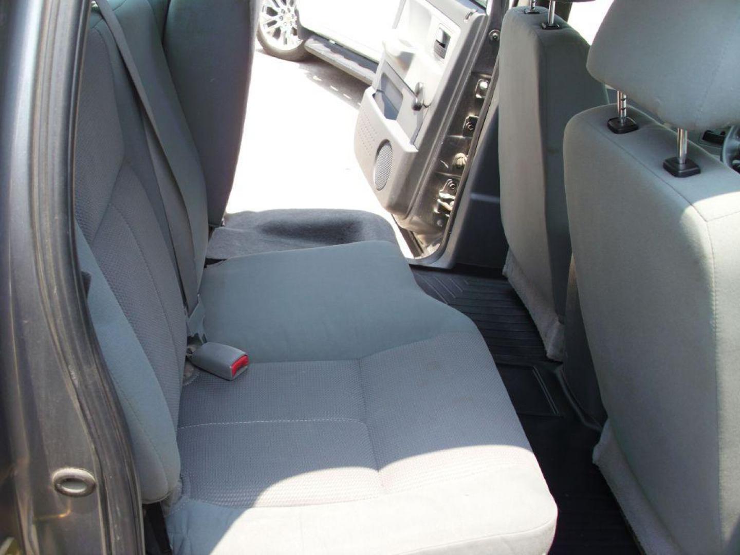 2005 GRAY DODGE DAKOTA QUAD (1D7HE28K15S) with an 3.7L engine, Automatic transmission, located at 12019 San Pedro Avenue, San Antonio, TX, 78216, (208) 269-7240, 29.550915, -98.491142 - Great Truck! ONE OWNER! No accidents or damages! Air Conditioning; Power Steering; Tilt Wheel; AM/FM CD; Dual Front Air Bag; Active Belts; Crew Cab; Short Bed; All Wheel ABS; 1/2 Ton We provide financing options through various third-party Credit Unions and Auto Finance Companies, including RBFC - Photo#13