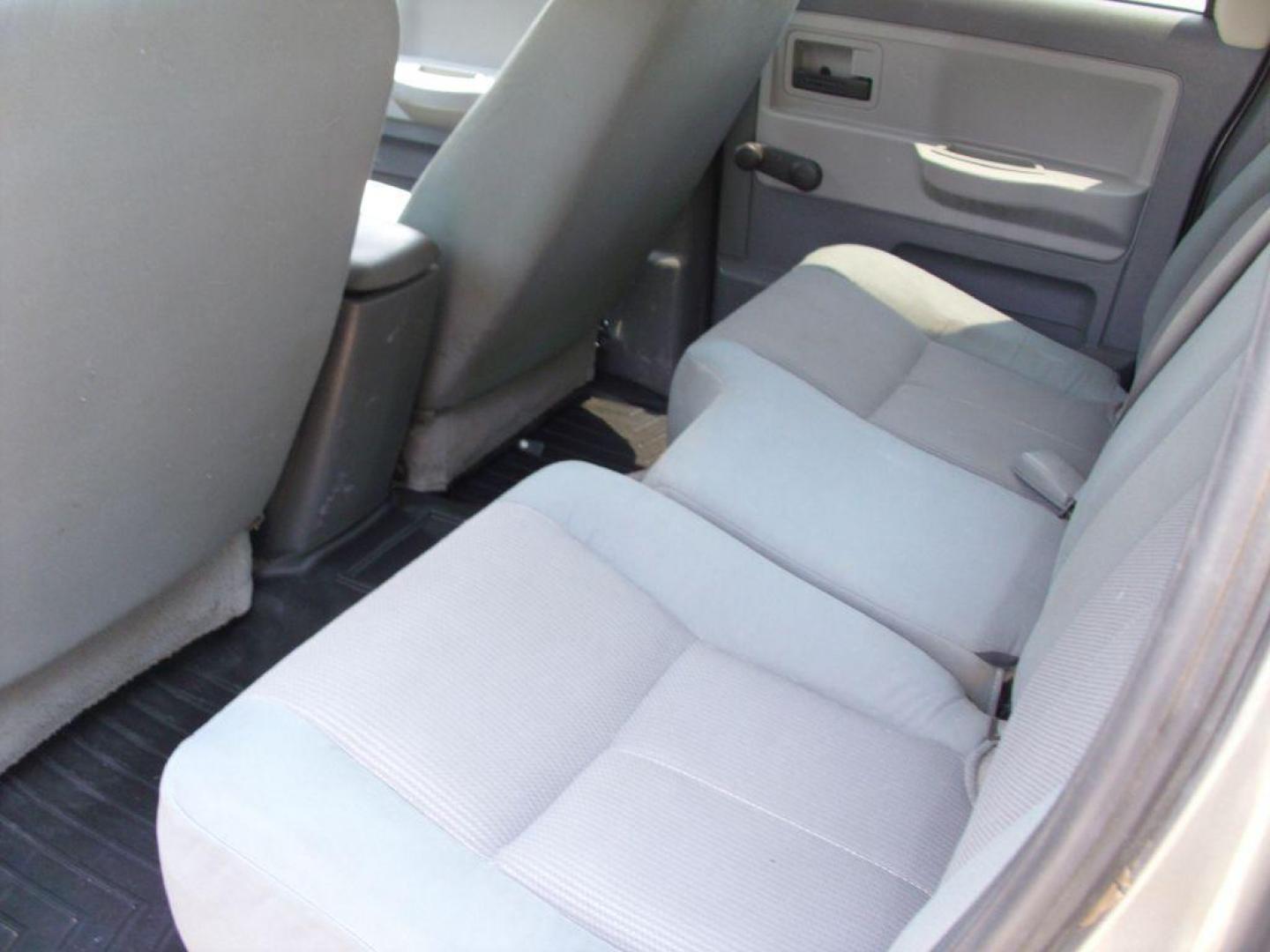 2005 GRAY DODGE DAKOTA QUAD (1D7HE28K15S) with an 3.7L engine, Automatic transmission, located at 12019 San Pedro Avenue, San Antonio, TX, 78216, (208) 269-7240, 29.550915, -98.491142 - Great Truck! ONE OWNER! No accidents or damages! Air Conditioning; Power Steering; Tilt Wheel; AM/FM CD; Dual Front Air Bag; Active Belts; Crew Cab; Short Bed; All Wheel ABS; 1/2 Ton We provide financing options through various third-party Credit Unions and Auto Finance Companies, including RBFC - Photo#16