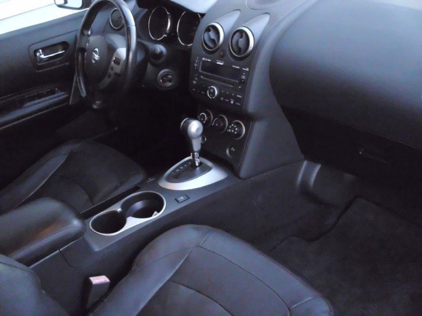 2010 GRAY NISSAN ROGUE S (JN8AS5MV5AW) with an 2.5L engine, Continuously Variable transmission, located at 2215 Harry Wurzbach Rd , San Antonio, TX, 78209, (208) 269-7240, 29.491415, -98.432098 - CARAX- Two Previous Owners! Low Miles! Leather Seats; Heated Seats; Air Conditioning; Power Windows; Power Locks; Power Steering; Tilt Wheel; AM/FM CD/MP3; Satellite; Immobilizer; Keyless Entry; Push Button Start; Alarm; Dual Front Airbags; Side Airbags; Head Airbags; Rear Head Airbags; Active Seatb - Photo#11