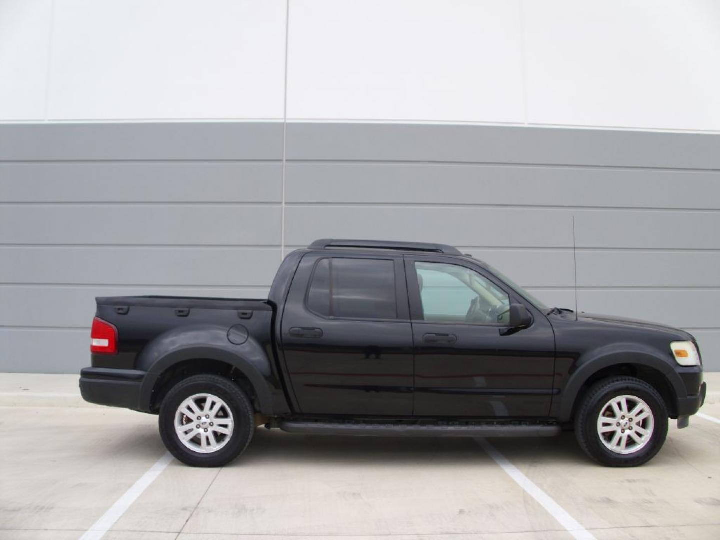 2009 BLACK FORD EXPLORER SPORT XLT (1FMEU31E49U) with an 4.0L engine, Automatic transmission, located at 2215 Harry Wurzbach Rd , San Antonio, TX, 78209, (208) 269-7240, 29.491415, -98.432098- Photo#0