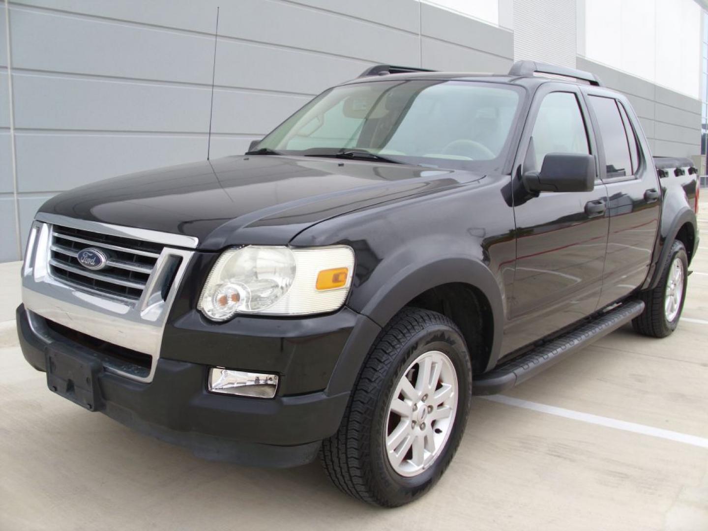 2009 BLACK FORD EXPLORER SPORT XLT (1FMEU31E49U) with an 4.0L engine, Automatic transmission, located at 2215 Harry Wurzbach Rd , San Antonio, TX, 78209, (208) 269-7240, 29.491415, -98.432098- Photo#2