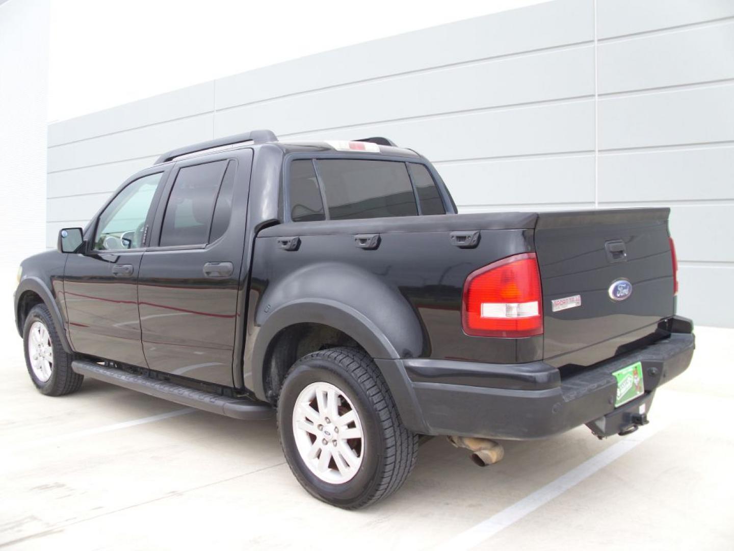 2009 BLACK FORD EXPLORER SPORT XLT (1FMEU31E49U) with an 4.0L engine, Automatic transmission, located at 2215 Harry Wurzbach Rd , San Antonio, TX, 78209, (208) 269-7240, 29.491415, -98.432098- Photo#5