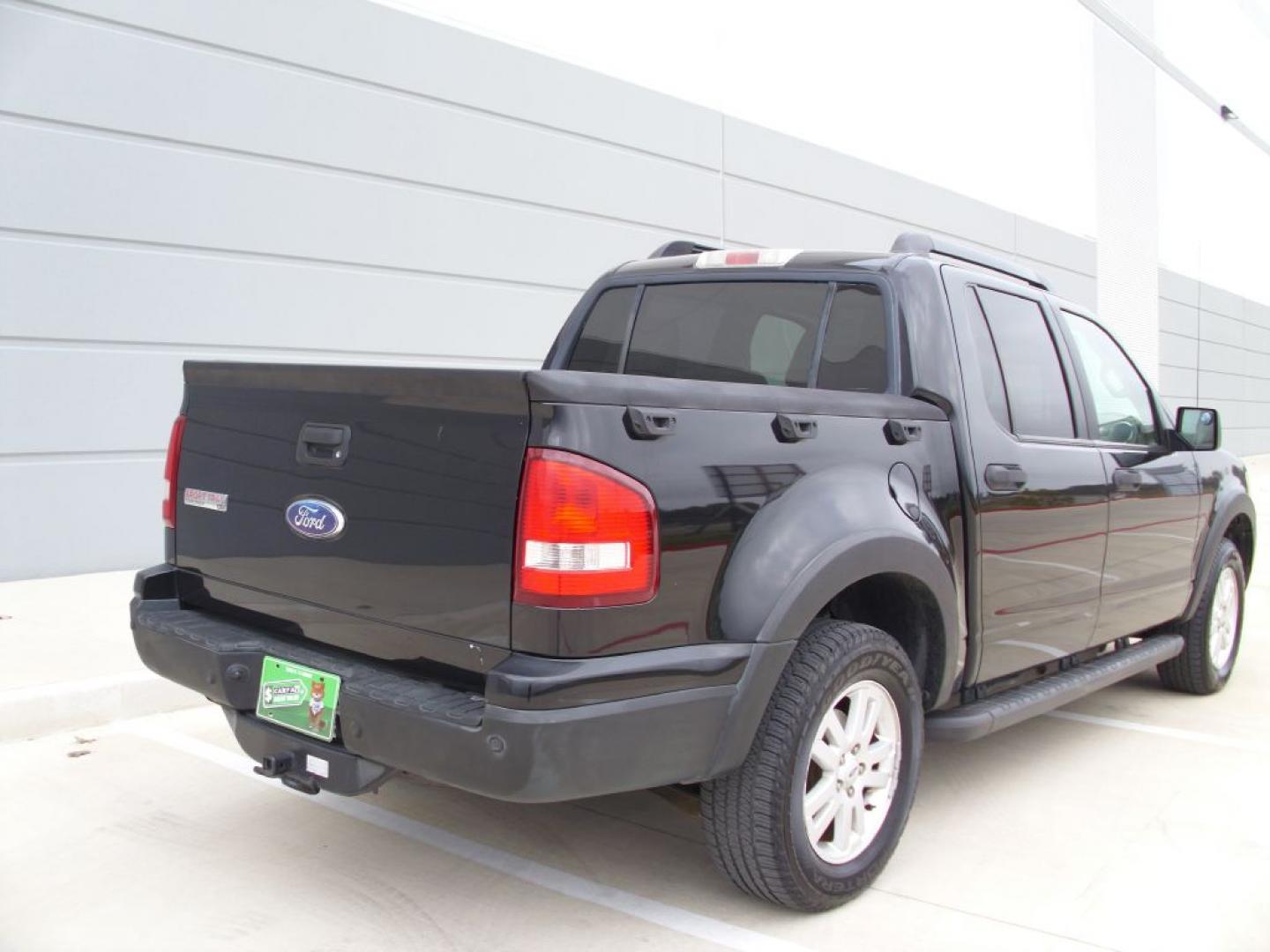 2009 BLACK FORD EXPLORER SPORT XLT (1FMEU31E49U) with an 4.0L engine, Automatic transmission, located at 2215 Harry Wurzbach Rd , San Antonio, TX, 78209, (208) 269-7240, 29.491415, -98.432098- Photo#6