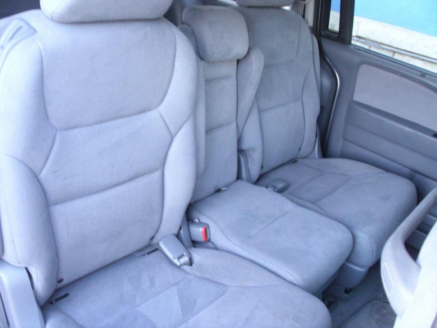 2007 SILVER HONDA ODYSSEY EX (5FNRL384X7B) with an 3.5L engine, Automatic transmission, San Antonio, TX, 78216, (208) 269-7240, 29.424601, -98.495140 - SPACIOUS SUV; FOLD- AWAY THIRD ROW; Rear Sunshade; Quad Seats; Rear Air Conditioning; Alloy Wheels; Cloth Seats; Air Conditioning; Power Windows; Power Locks; Power Steering; Tilt Wheel; AM/FM CD; Immobilizer; Keyless Entry; Alarm; Dual Front Airbags; Side Airbags; Head Airbags; Rear Head Airbags; A - Photo#10