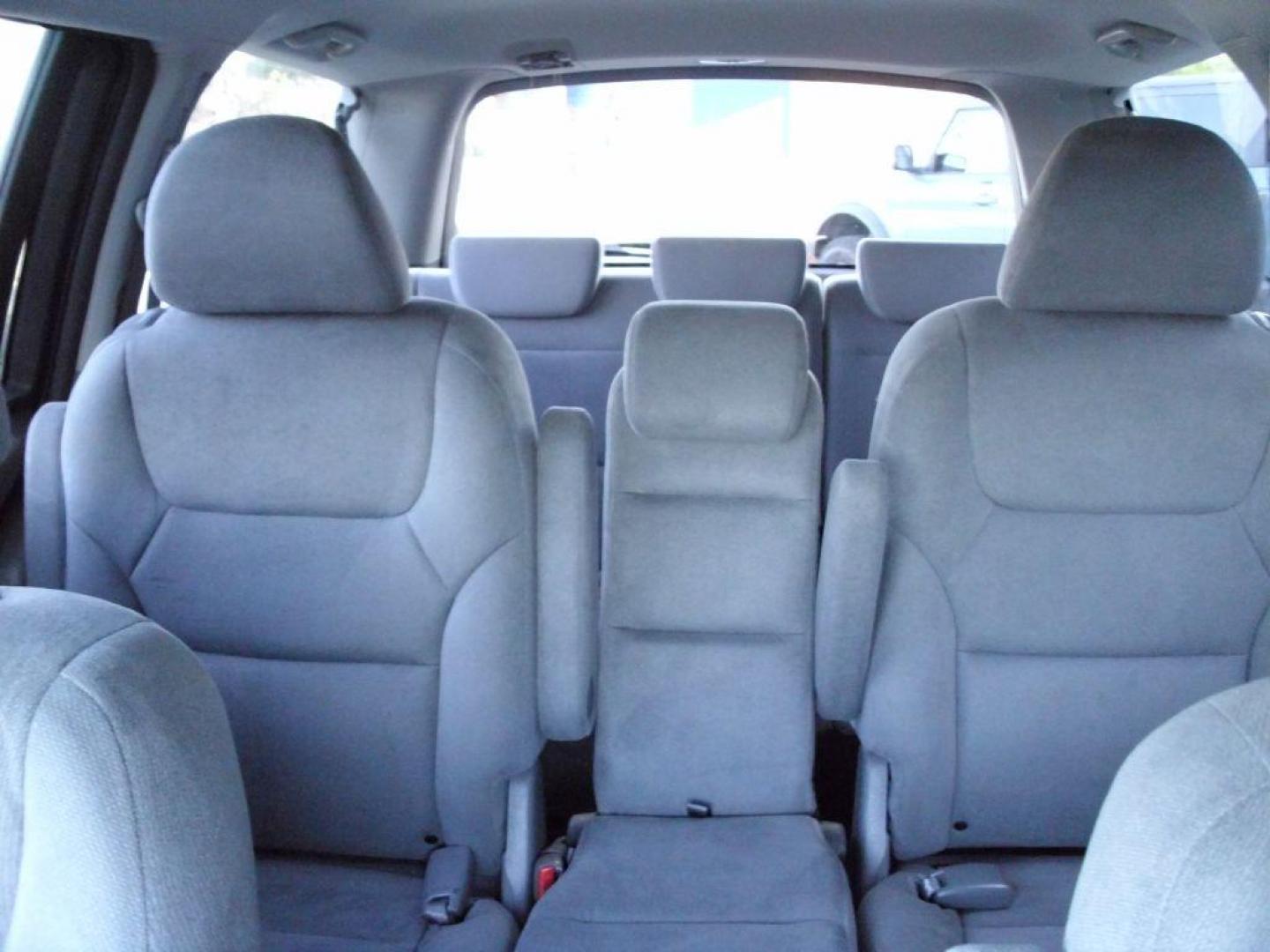 2007 SILVER HONDA ODYSSEY EX (5FNRL384X7B) with an 3.5L engine, Automatic transmission, San Antonio, TX, 78216, (208) 269-7240, 29.424601, -98.495140 - SPACIOUS SUV; FOLD- AWAY THIRD ROW; Rear Sunshade; Quad Seats; Rear Air Conditioning; Alloy Wheels; Cloth Seats; Air Conditioning; Power Windows; Power Locks; Power Steering; Tilt Wheel; AM/FM CD; Immobilizer; Keyless Entry; Alarm; Dual Front Airbags; Side Airbags; Head Airbags; Rear Head Airbags; A - Photo#22