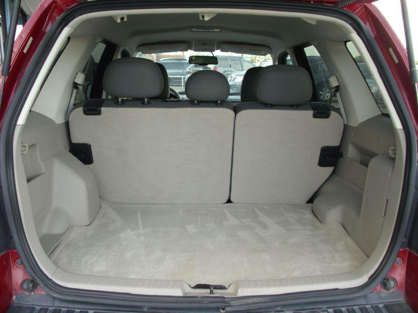 2009 RED FORD ESCAPE XLT (1FMCU93G29K) with an 3.0L engine, Automatic transmission, located at 2215 Harry Wurzbach Rd , San Antonio, TX, 78209, (208) 269-7240, 29.491415, -98.432098 - 4WD/AWD; ALLOY WHEELS- NO ACCIDENTS OR DAMAGES REPORTED! Cloth Seats; Satellite Radio ready; Air Conditioning; Power Windows; Power Locks; Power Steering; Tilt Wheel; Satellite; AM/FM CD/MP3; Immobilizer; Keyless Entry; Alarm; Available; Dual Airbags Front Head and Side; Active Seatbelts; Passenger - Photo#12