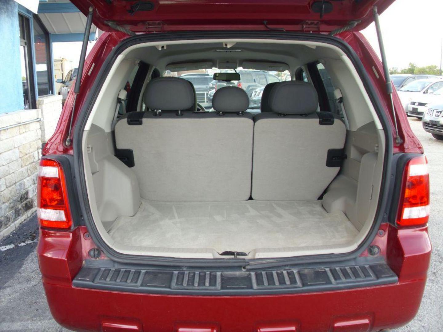 2009 RED FORD ESCAPE XLT (1FMCU93G29K) with an 3.0L engine, Automatic transmission, located at 2215 Harry Wurzbach Rd , San Antonio, TX, 78209, (208) 269-7240, 29.491415, -98.432098 - 4WD/AWD; ALLOY WHEELS- NO ACCIDENTS OR DAMAGES REPORTED! Cloth Seats; Satellite Radio ready; Air Conditioning; Power Windows; Power Locks; Power Steering; Tilt Wheel; Satellite; AM/FM CD/MP3; Immobilizer; Keyless Entry; Alarm; Available; Dual Airbags Front Head and Side; Active Seatbelts; Passenger - Photo#13