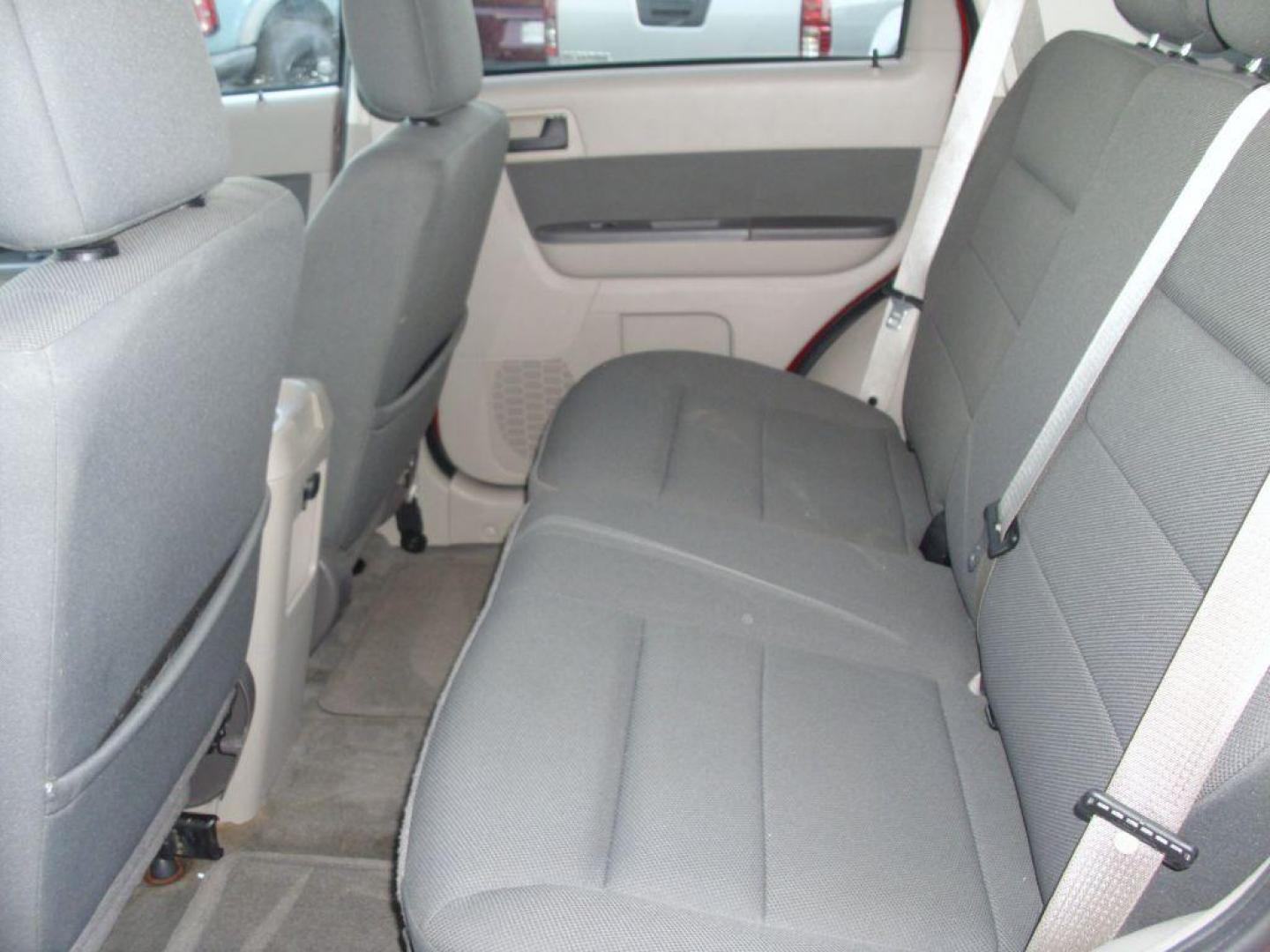 2009 RED FORD ESCAPE XLT (1FMCU93G29K) with an 3.0L engine, Automatic transmission, located at 2215 Harry Wurzbach Rd , San Antonio, TX, 78209, (208) 269-7240, 29.491415, -98.432098 - 4WD/AWD; ALLOY WHEELS- NO ACCIDENTS OR DAMAGES REPORTED! Cloth Seats; Satellite Radio ready; Air Conditioning; Power Windows; Power Locks; Power Steering; Tilt Wheel; Satellite; AM/FM CD/MP3; Immobilizer; Keyless Entry; Alarm; Available; Dual Airbags Front Head and Side; Active Seatbelts; Passenger - Photo#14