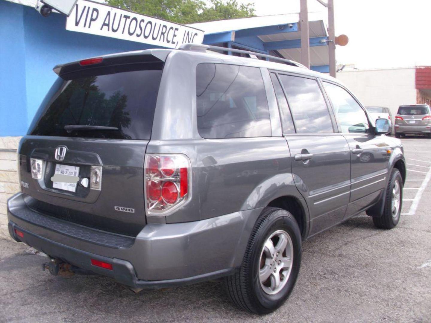 2007 GRAY HONDA PILOT EXL (2HKYF18777H) with an 3.5L engine, Automatic transmission, located at 2215 Harry Wurzbach Rd , San Antonio, TX, 78209, (208) 269-7240, 29.491415, -98.432098 - GREAT VEHICLE FOR ROAD TRIPS! 4WD/AWD- ALLOY WHEELS- FOLD AWAY THIRD ROW! ONE OWNER!! Front Seat Heaters; Leather Seats; Navigation System; Rear View Camera; Sunroof(s); Air Conditioning; Power Windows; Power Locks; Power Steering; Tilt Wheel; AM/FM CD; Satellite; AM/FM CD/DVD; Immobilizer; Keyless - Photo#1