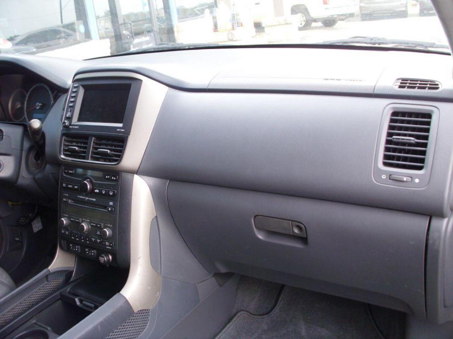 2007 GRAY HONDA PILOT EXL (2HKYF18777H) with an 3.5L engine, Automatic transmission, located at 2215 Harry Wurzbach Rd , San Antonio, TX, 78209, (208) 269-7240, 29.491415, -98.432098 - GREAT VEHICLE FOR ROAD TRIPS! 4WD/AWD- ALLOY WHEELS- FOLD AWAY THIRD ROW! ONE OWNER!! Front Seat Heaters; Leather Seats; Navigation System; Rear View Camera; Sunroof(s); Air Conditioning; Power Windows; Power Locks; Power Steering; Tilt Wheel; AM/FM CD; Satellite; AM/FM CD/DVD; Immobilizer; Keyless - Photo#7