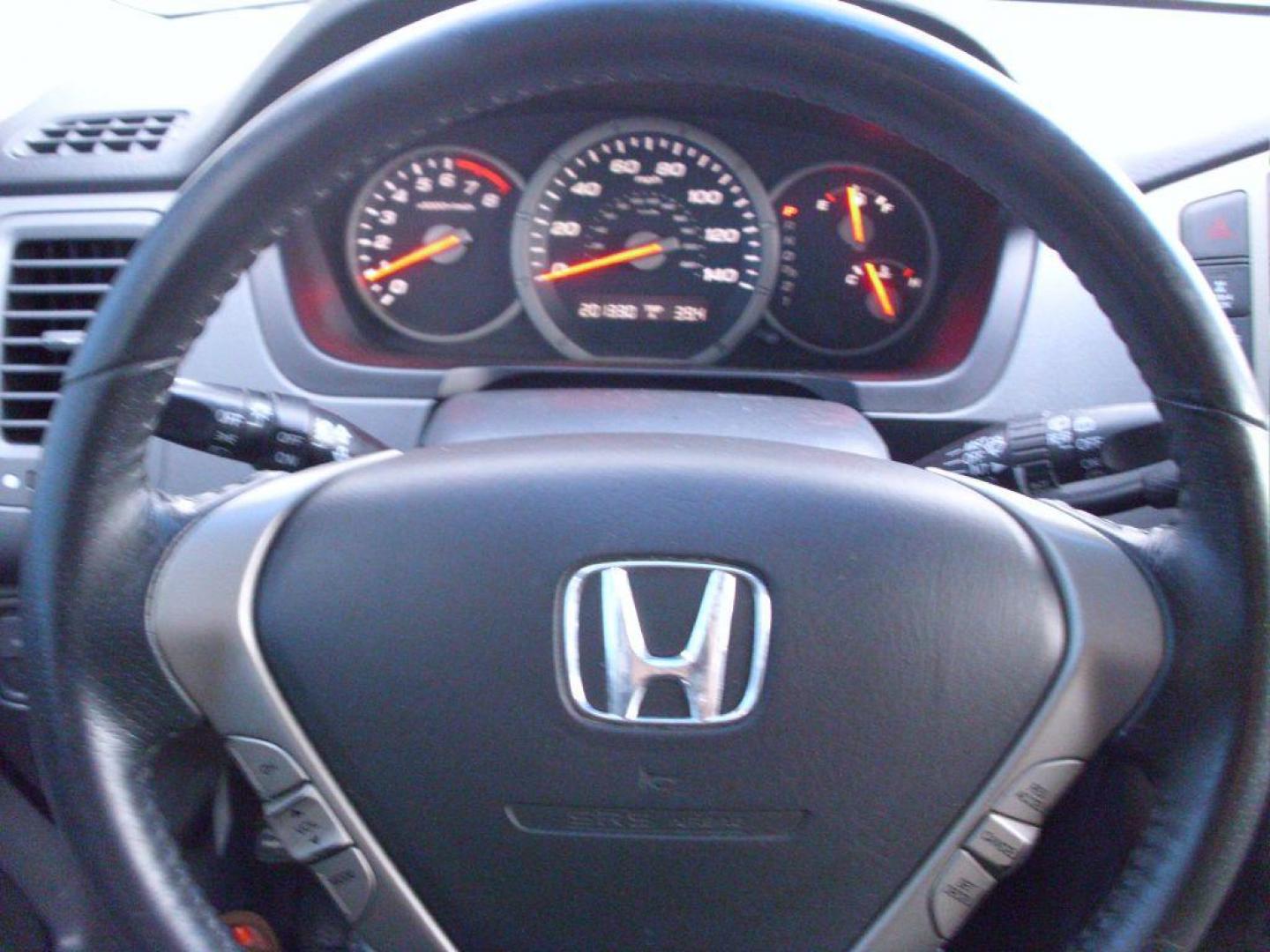 2007 GRAY HONDA PILOT EXL (2HKYF18777H) with an 3.5L engine, Automatic transmission, located at 2215 Harry Wurzbach Rd , San Antonio, TX, 78209, (208) 269-7240, 29.491415, -98.432098 - GREAT VEHICLE FOR ROAD TRIPS! 4WD/AWD- ALLOY WHEELS- FOLD AWAY THIRD ROW! ONE OWNER!! Front Seat Heaters; Leather Seats; Navigation System; Rear View Camera; Sunroof(s); Air Conditioning; Power Windows; Power Locks; Power Steering; Tilt Wheel; AM/FM CD; Satellite; AM/FM CD/DVD; Immobilizer; Keyless - Photo#12