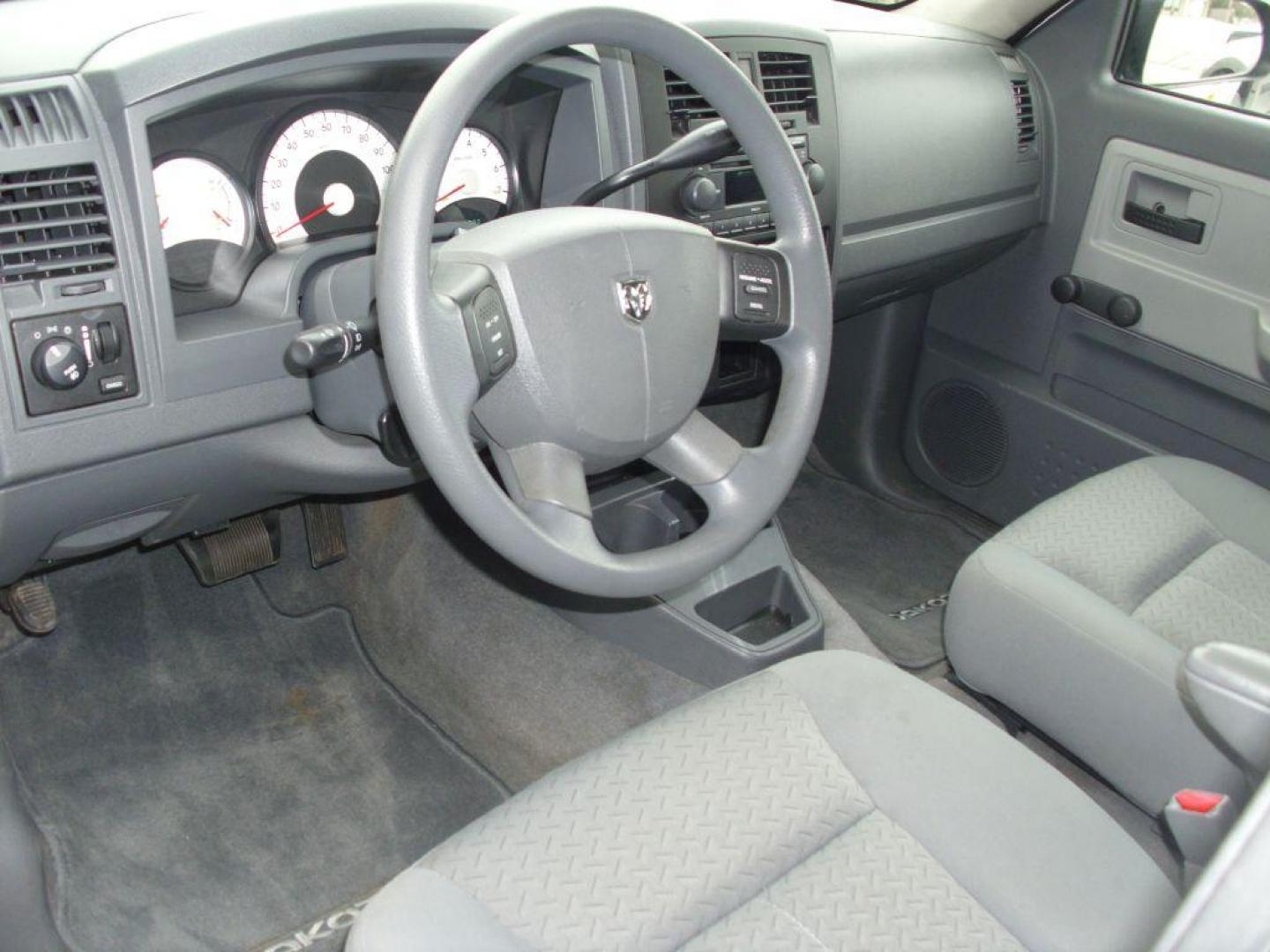 2007 WHITE DODGE DAKOTA QUAD (1D7HE28K47S) with an 3.7L engine, Automatic transmission, located at 2215 Harry Wurzbach Rd , San Antonio, TX, 78209, (208) 269-7240, 29.491415, -98.432098 - RELIABLE TRUCK - NO ACCIDENTS OR DAMAGES! SPORT PACKAGE! 2WD; Cloth Seats; Tow Hitch; Air Conditioning; ABS Brakes; Automatic Transmission; Cruise Control; Power Steering; Tilt Wheel; AM/FM CD; Satellite; Dual Front Air Bag; Active Belts; Crew Cab; Short Bed; All Wheel ABS; 1/2 Ton We provide fi - Photo#7