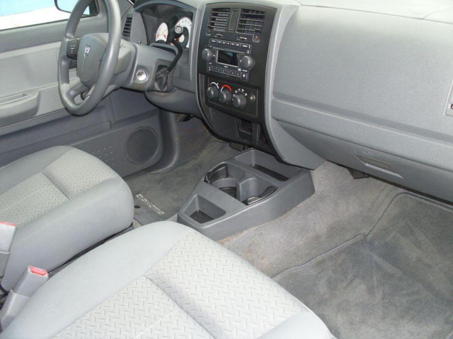 2007 WHITE DODGE DAKOTA QUAD (1D7HE28K47S) with an 3.7L engine, Automatic transmission, located at 2215 Harry Wurzbach Rd , San Antonio, TX, 78209, (208) 269-7240, 29.491415, -98.432098 - RELIABLE TRUCK - NO ACCIDENTS OR DAMAGES! SPORT PACKAGE! 2WD; Cloth Seats; Tow Hitch; Air Conditioning; ABS Brakes; Automatic Transmission; Cruise Control; Power Steering; Tilt Wheel; AM/FM CD; Satellite; Dual Front Air Bag; Active Belts; Crew Cab; Short Bed; All Wheel ABS; 1/2 Ton We provide fi - Photo#9
