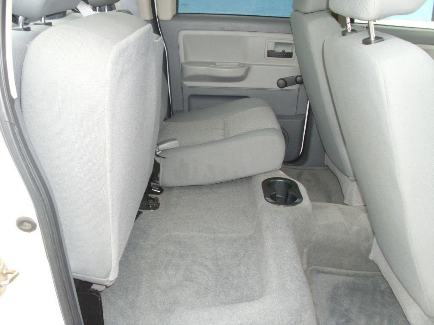 2007 WHITE DODGE DAKOTA QUAD (1D7HE28K47S) with an 3.7L engine, Automatic transmission, located at 2215 Harry Wurzbach Rd , San Antonio, TX, 78209, (208) 269-7240, 29.491415, -98.432098 - RELIABLE TRUCK - NO ACCIDENTS OR DAMAGES! SPORT PACKAGE! 2WD; Cloth Seats; Tow Hitch; Air Conditioning; ABS Brakes; Automatic Transmission; Cruise Control; Power Steering; Tilt Wheel; AM/FM CD; Satellite; Dual Front Air Bag; Active Belts; Crew Cab; Short Bed; All Wheel ABS; 1/2 Ton We provide fi - Photo#11