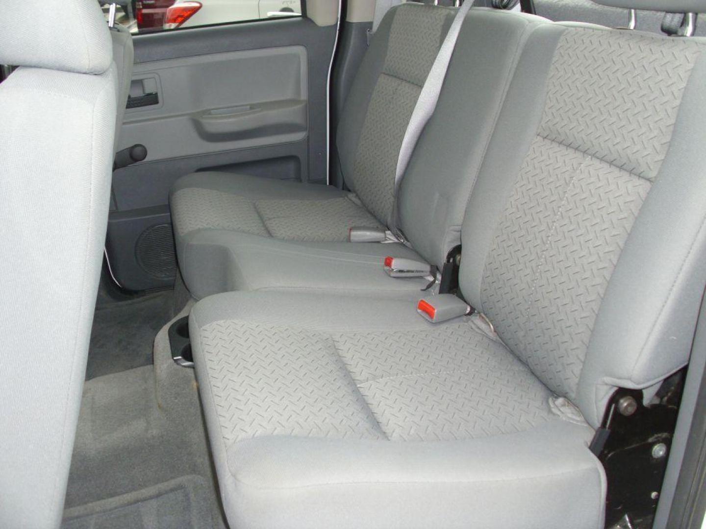 2007 WHITE DODGE DAKOTA QUAD (1D7HE28K47S) with an 3.7L engine, Automatic transmission, located at 2215 Harry Wurzbach Rd , San Antonio, TX, 78209, (208) 269-7240, 29.491415, -98.432098 - RELIABLE TRUCK - NO ACCIDENTS OR DAMAGES! SPORT PACKAGE! 2WD; Cloth Seats; Tow Hitch; Air Conditioning; ABS Brakes; Automatic Transmission; Cruise Control; Power Steering; Tilt Wheel; AM/FM CD; Satellite; Dual Front Air Bag; Active Belts; Crew Cab; Short Bed; All Wheel ABS; 1/2 Ton We provide fi - Photo#14