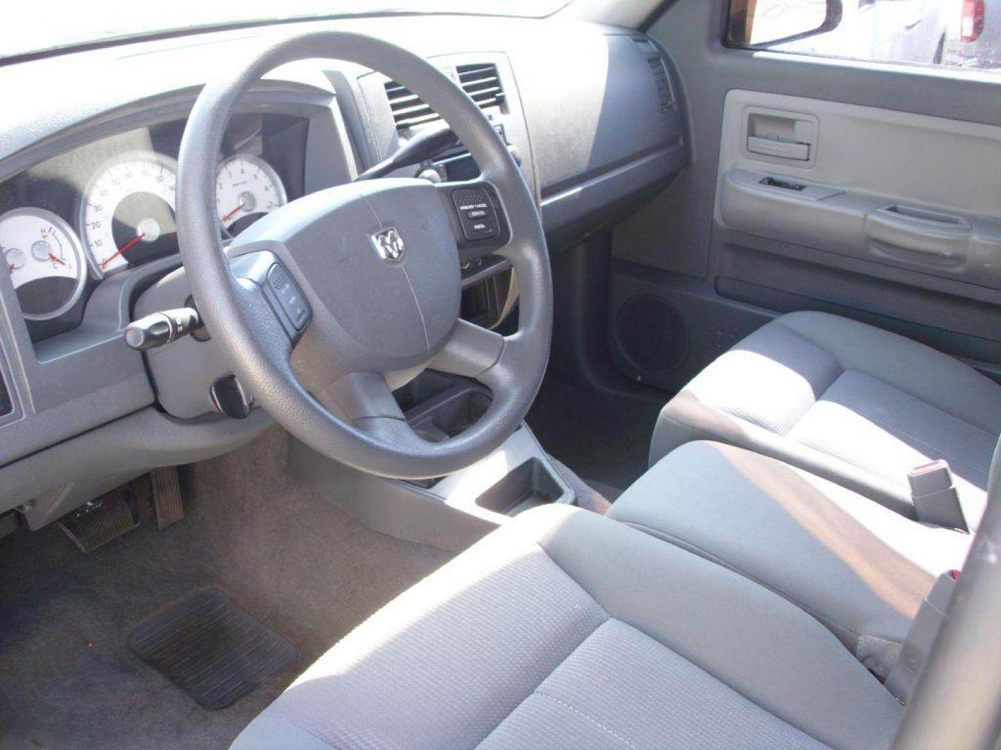 2006 BLUE DODGE DAKOTA SLT (1D7HE42KX6S) with an 3.7L engine, Automatic transmission, located at 2215 Harry Wurzbach Rd , San Antonio, TX, 78209, (208) 269-7240, 29.491415, -98.432098 - GREAT TRUCK WITH A BED COVER AND A BED LINER!! Automatic Transmission, Alloy Wheels, Bed Liner, Cloth Seats, Cruise Control, Air Conditioning; Power Windows; Power Mirrors, Power Seat(s), Tow Hitch, Power Locks; Power Steering; Tilt Wheel; AM/FM CD; Passive sentry key; Available; Dual Front Air Bag; - Photo#13