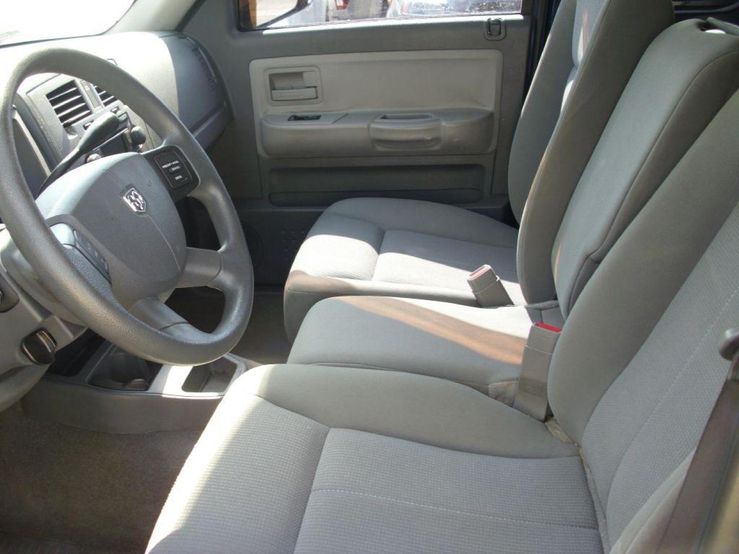 2006 BLUE DODGE DAKOTA SLT (1D7HE42KX6S) with an 3.7L engine, Automatic transmission, located at 2215 Harry Wurzbach Rd , San Antonio, TX, 78209, (208) 269-7240, 29.491415, -98.432098 - GREAT TRUCK WITH A BED COVER AND A BED LINER!! Automatic Transmission, Alloy Wheels, Bed Liner, Cloth Seats, Cruise Control, Air Conditioning; Power Windows; Power Mirrors, Power Seat(s), Tow Hitch, Power Locks; Power Steering; Tilt Wheel; AM/FM CD; Passive sentry key; Available; Dual Front Air Bag; - Photo#14
