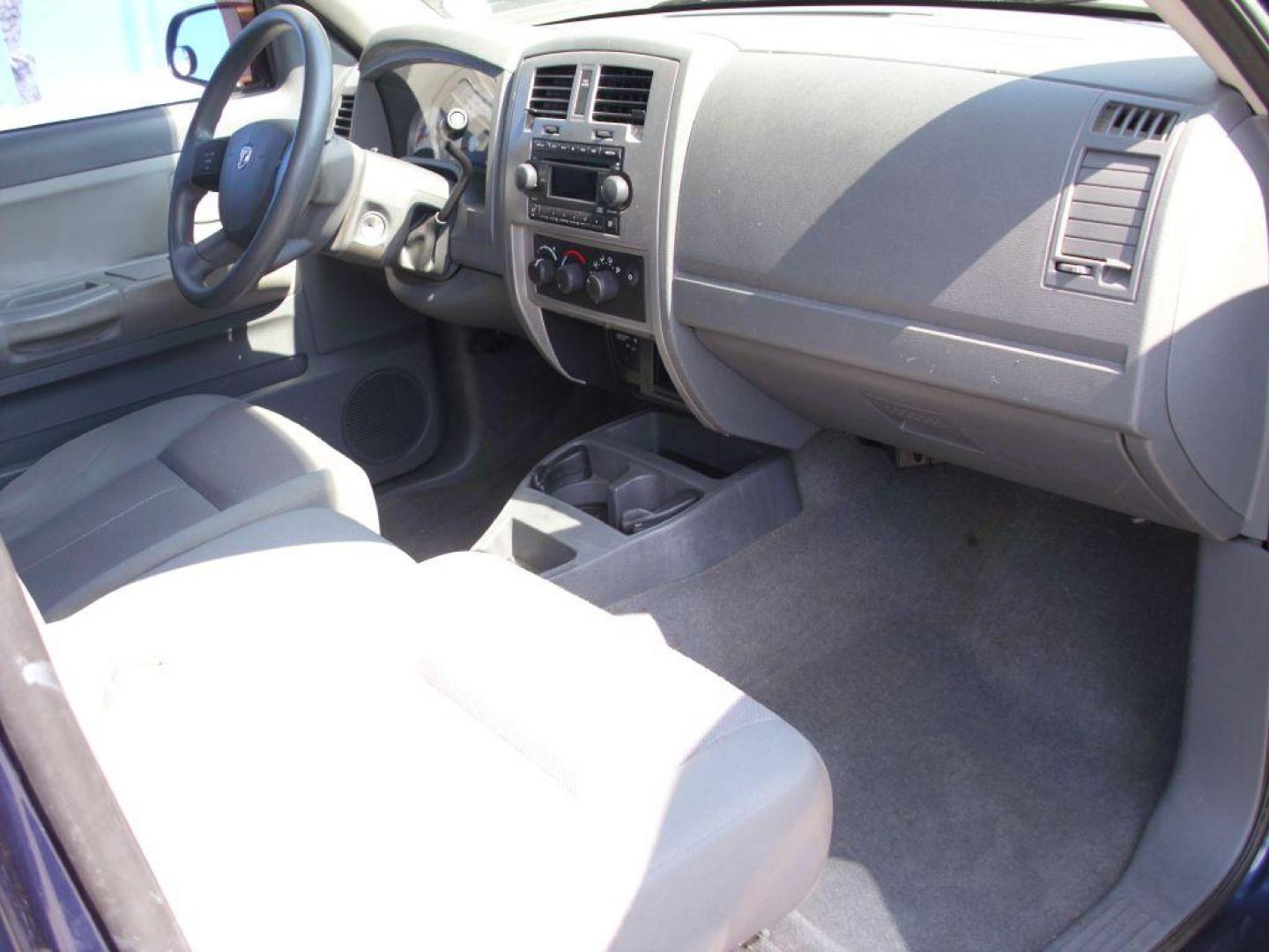 2006 BLUE DODGE DAKOTA SLT (1D7HE42KX6S) with an 3.7L engine, Automatic transmission, located at 2215 Harry Wurzbach Rd , San Antonio, TX, 78209, (208) 269-7240, 29.491415, -98.432098 - GREAT TRUCK WITH A BED COVER AND A BED LINER!! Automatic Transmission, Alloy Wheels, Bed Liner, Cloth Seats, Cruise Control, Air Conditioning; Power Windows; Power Mirrors, Power Seat(s), Tow Hitch, Power Locks; Power Steering; Tilt Wheel; AM/FM CD; Passive sentry key; Available; Dual Front Air Bag; - Photo#15