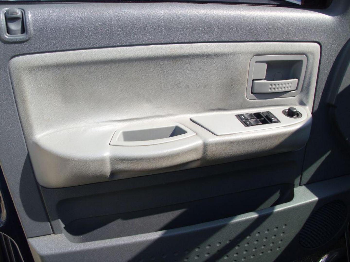 2006 BLUE DODGE DAKOTA SLT (1D7HE42KX6S) with an 3.7L engine, Automatic transmission, located at 2215 Harry Wurzbach Rd , San Antonio, TX, 78209, (208) 269-7240, 29.491415, -98.432098 - GREAT TRUCK WITH A BED COVER AND A BED LINER!! Automatic Transmission, Alloy Wheels, Bed Liner, Cloth Seats, Cruise Control, Air Conditioning; Power Windows; Power Mirrors, Power Seat(s), Tow Hitch, Power Locks; Power Steering; Tilt Wheel; AM/FM CD; Passive sentry key; Available; Dual Front Air Bag; - Photo#16