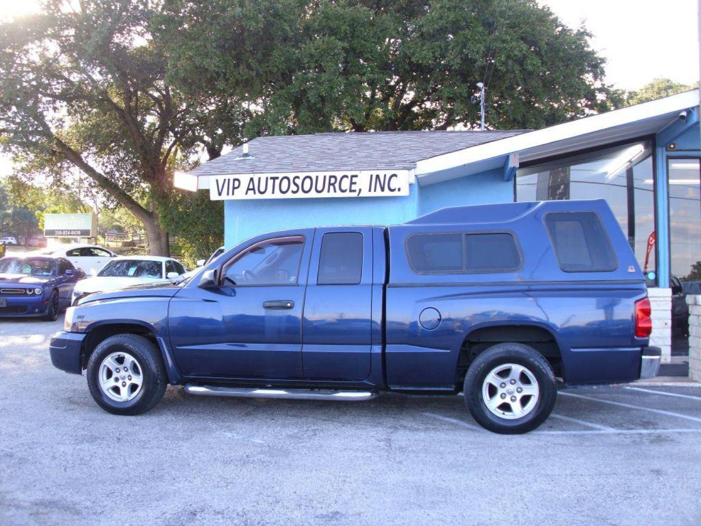 2006 BLUE DODGE DAKOTA SLT (1D7HE42KX6S) with an 3.7L engine, Automatic transmission, located at 2215 Harry Wurzbach Rd , San Antonio, TX, 78209, (208) 269-7240, 29.491415, -98.432098 - GREAT TRUCK WITH A BED COVER AND A BED LINER!! Automatic Transmission, Alloy Wheels, Bed Liner, Cloth Seats, Cruise Control, Air Conditioning; Power Windows; Power Mirrors, Power Seat(s), Tow Hitch, Power Locks; Power Steering; Tilt Wheel; AM/FM CD; Passive sentry key; Available; Dual Front Air Bag; - Photo#3