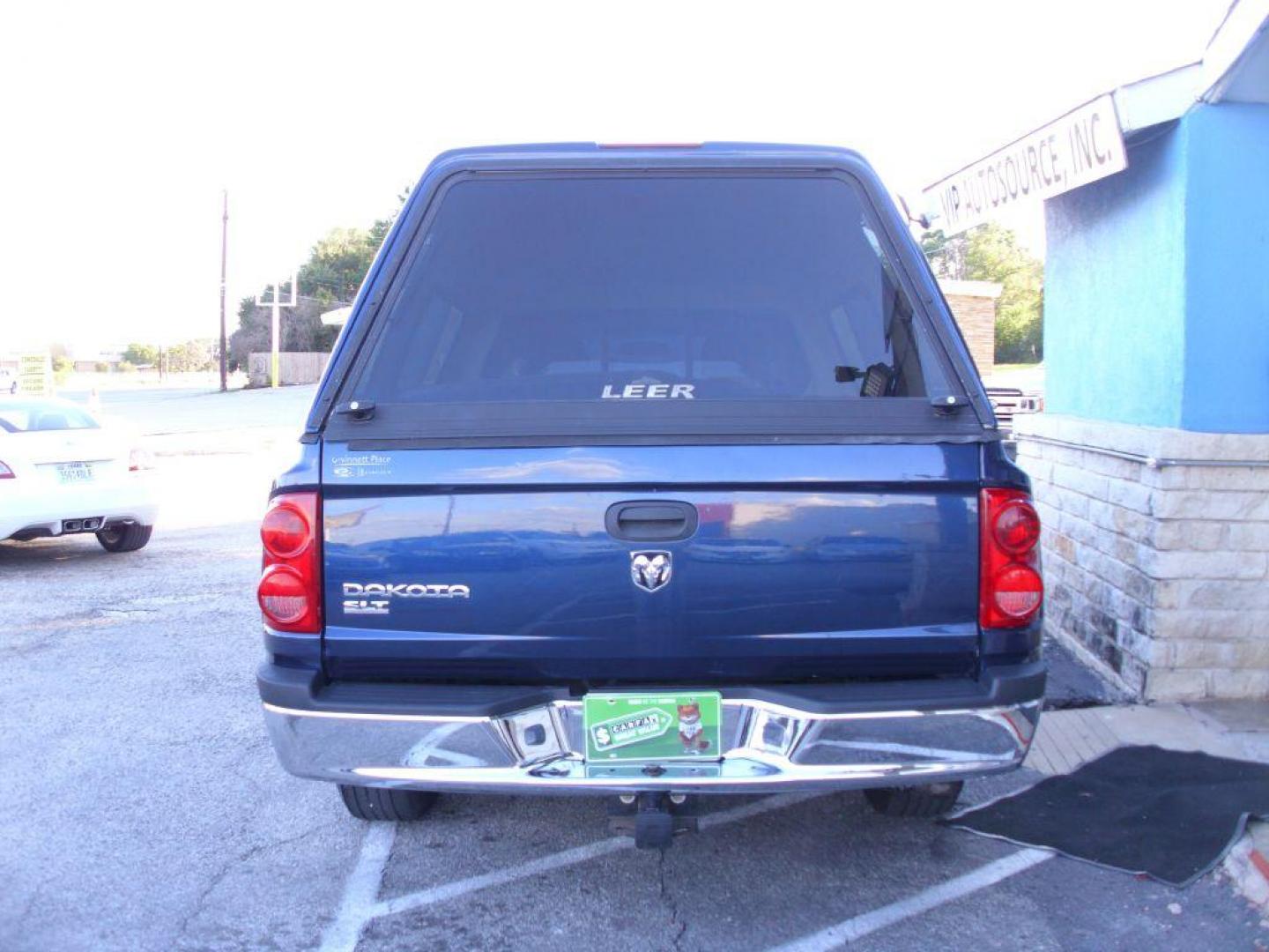 2006 BLUE DODGE DAKOTA SLT (1D7HE42KX6S) with an 3.7L engine, Automatic transmission, located at 2215 Harry Wurzbach Rd , San Antonio, TX, 78209, (208) 269-7240, 29.491415, -98.432098 - GREAT TRUCK WITH A BED COVER AND A BED LINER!! Automatic Transmission, Alloy Wheels, Bed Liner, Cloth Seats, Cruise Control, Air Conditioning; Power Windows; Power Mirrors, Power Seat(s), Tow Hitch, Power Locks; Power Steering; Tilt Wheel; AM/FM CD; Passive sentry key; Available; Dual Front Air Bag; - Photo#5