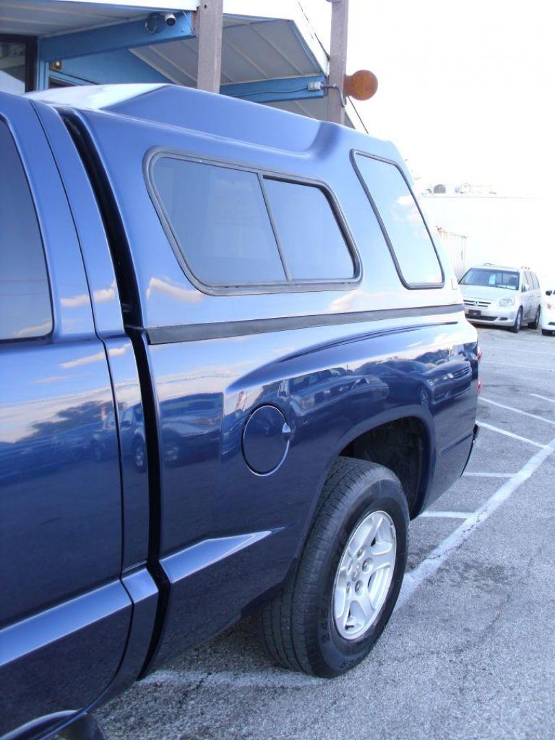 2006 BLUE DODGE DAKOTA SLT (1D7HE42KX6S) with an 3.7L engine, Automatic transmission, located at 2215 Harry Wurzbach Rd , San Antonio, TX, 78209, (208) 269-7240, 29.491415, -98.432098 - GREAT TRUCK WITH A BED COVER AND A BED LINER!! Automatic Transmission, Alloy Wheels, Bed Liner, Cloth Seats, Cruise Control, Air Conditioning; Power Windows; Power Mirrors, Power Seat(s), Tow Hitch, Power Locks; Power Steering; Tilt Wheel; AM/FM CD; Passive sentry key; Available; Dual Front Air Bag; - Photo#6