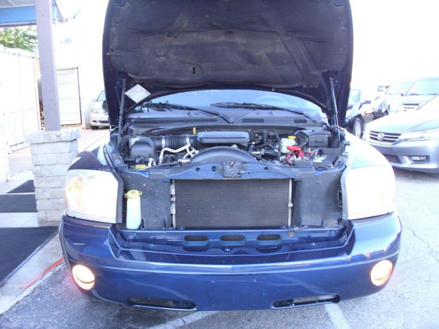 2006 BLUE DODGE DAKOTA SLT (1D7HE42KX6S) with an 3.7L engine, Automatic transmission, located at 2215 Harry Wurzbach Rd , San Antonio, TX, 78209, (208) 269-7240, 29.491415, -98.432098 - GREAT TRUCK WITH A BED COVER AND A BED LINER!! Automatic Transmission, Alloy Wheels, Bed Liner, Cloth Seats, Cruise Control, Air Conditioning; Power Windows; Power Mirrors, Power Seat(s), Tow Hitch, Power Locks; Power Steering; Tilt Wheel; AM/FM CD; Passive sentry key; Available; Dual Front Air Bag; - Photo#7