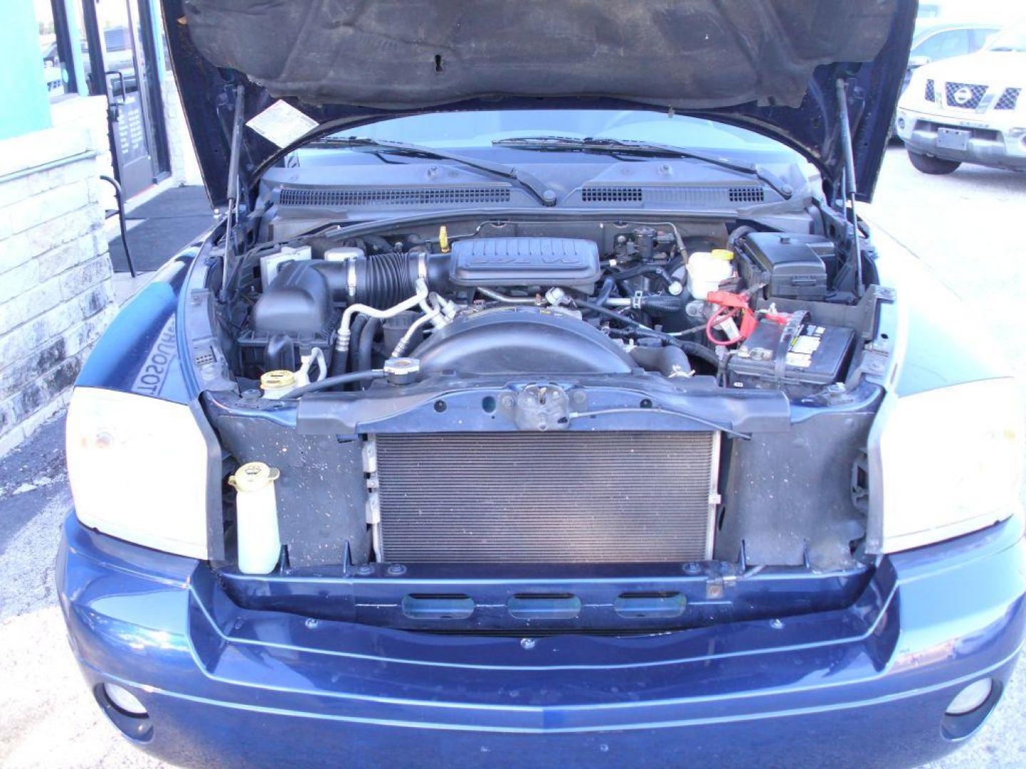 2006 BLUE DODGE DAKOTA SLT (1D7HE42KX6S) with an 3.7L engine, Automatic transmission, located at 2215 Harry Wurzbach Rd , San Antonio, TX, 78209, (208) 269-7240, 29.491415, -98.432098 - GREAT TRUCK WITH A BED COVER AND A BED LINER!! Automatic Transmission, Alloy Wheels, Bed Liner, Cloth Seats, Cruise Control, Air Conditioning; Power Windows; Power Mirrors, Power Seat(s), Tow Hitch, Power Locks; Power Steering; Tilt Wheel; AM/FM CD; Passive sentry key; Available; Dual Front Air Bag; - Photo#8