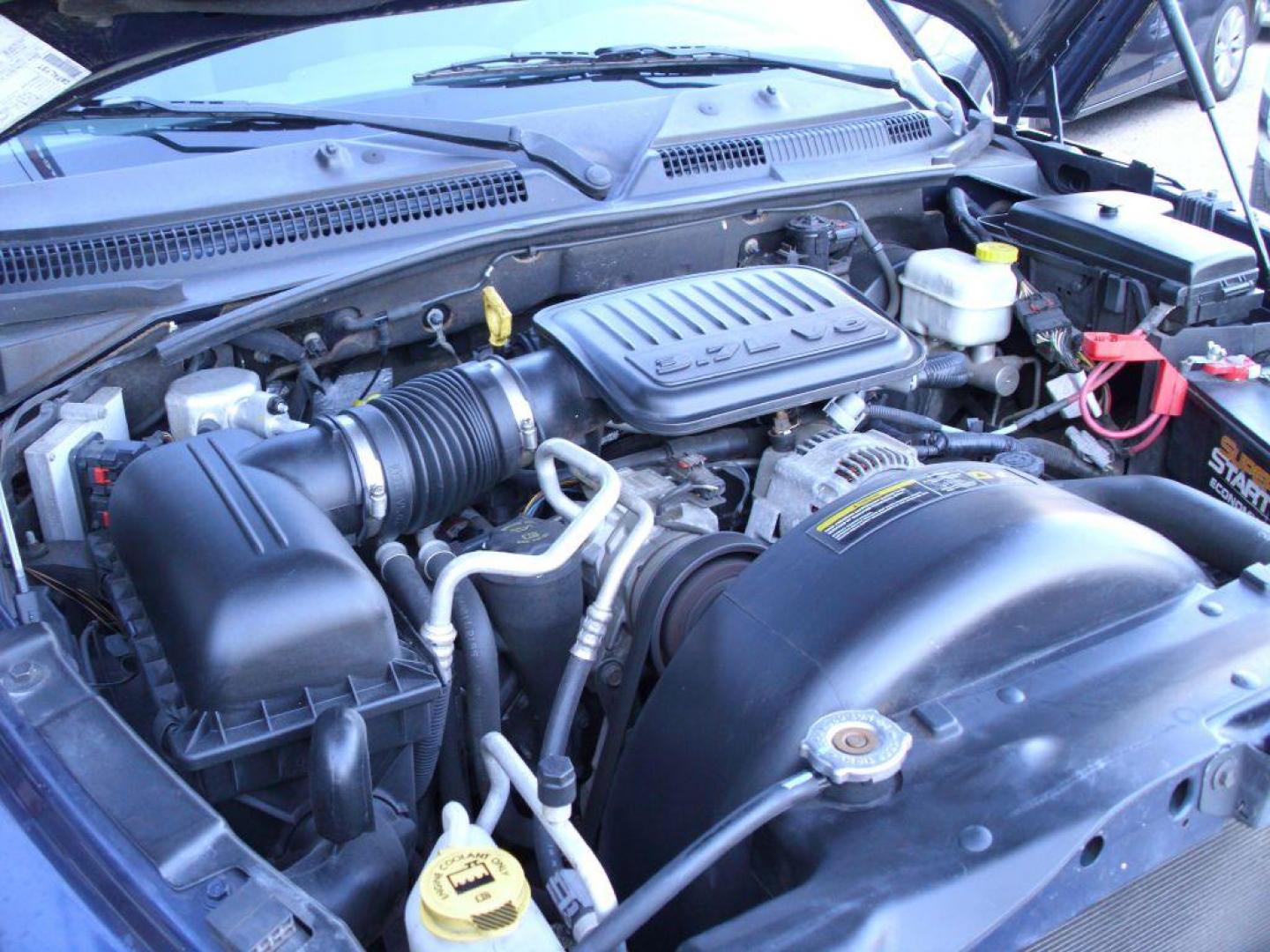 2006 BLUE DODGE DAKOTA SLT (1D7HE42KX6S) with an 3.7L engine, Automatic transmission, located at 2215 Harry Wurzbach Rd , San Antonio, TX, 78209, (208) 269-7240, 29.491415, -98.432098 - GREAT TRUCK WITH A BED COVER AND A BED LINER!! Automatic Transmission, Alloy Wheels, Bed Liner, Cloth Seats, Cruise Control, Air Conditioning; Power Windows; Power Mirrors, Power Seat(s), Tow Hitch, Power Locks; Power Steering; Tilt Wheel; AM/FM CD; Passive sentry key; Available; Dual Front Air Bag; - Photo#11